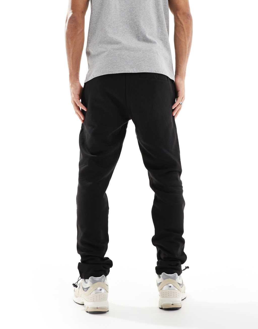 Threadbare sweatpants with ankle toggle adjuster in black Product Image