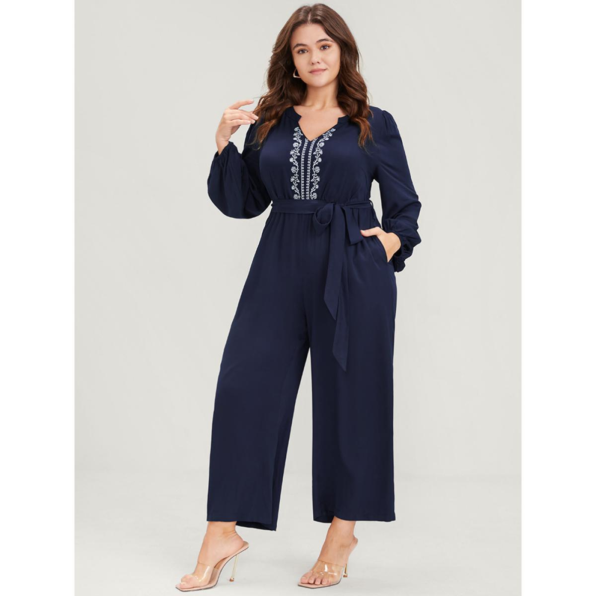 Plus Size DarkBlue Solid V Neck Lantern Sleeve Embroidered Pocket Ties Jumpsuit Women Elegant Long Sleeve V-neck Dailywear Loose Jumpsuits BloomChic 28/5X Product Image