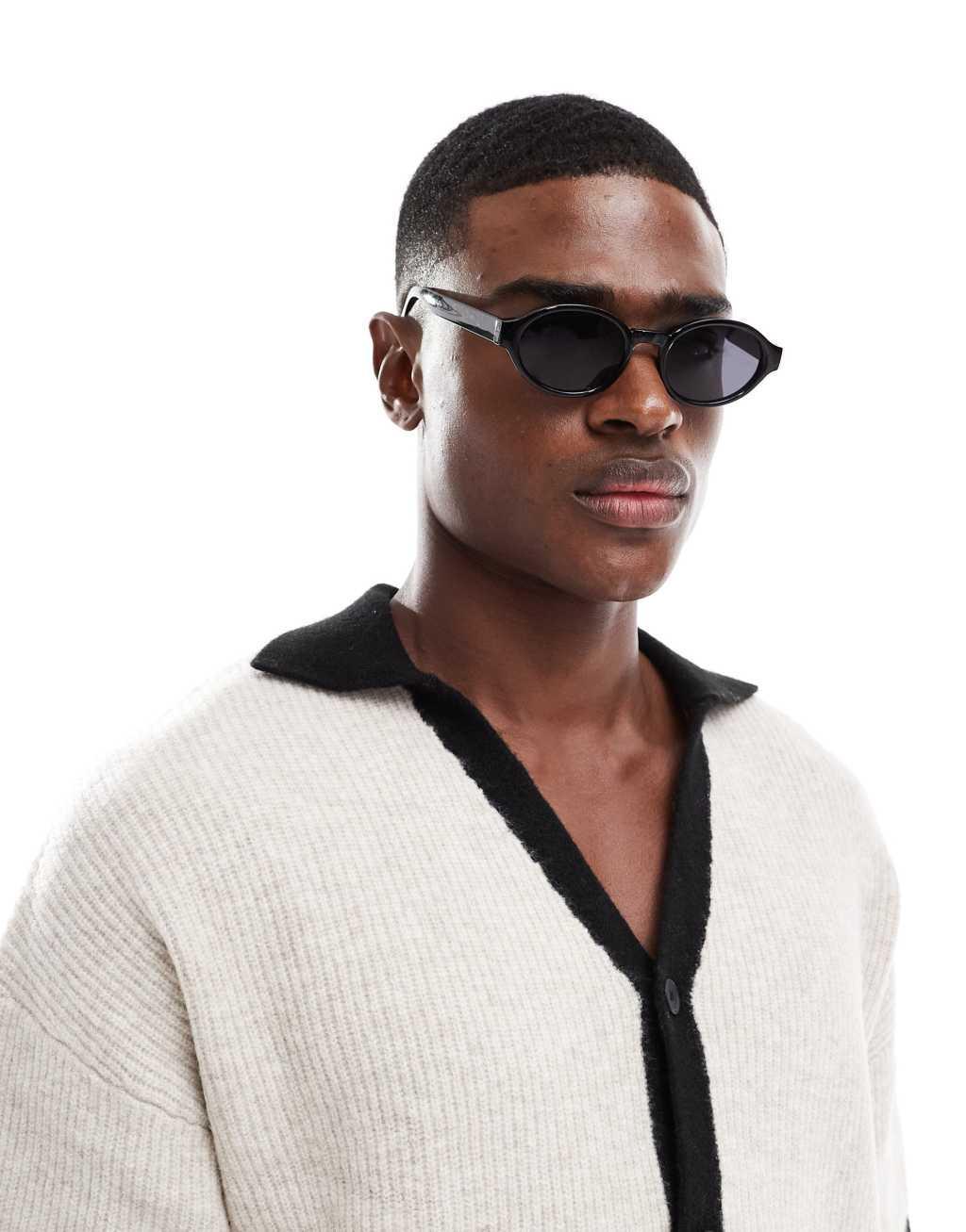ASOS DESIGN oval sunglasses in black Product Image