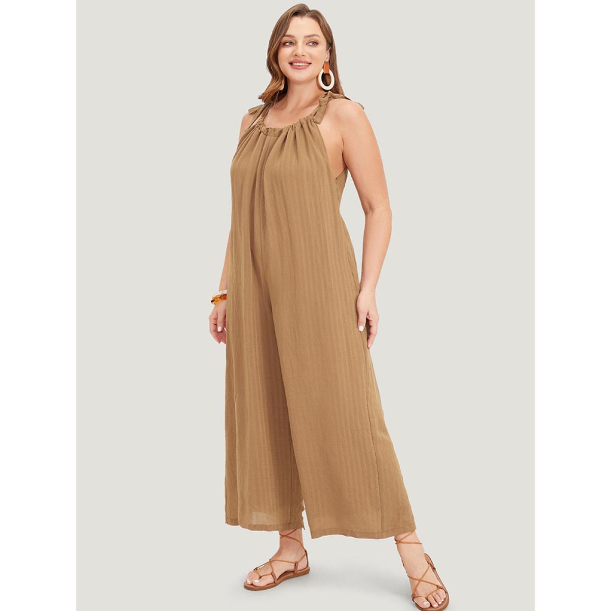 Plus Size Bronze Plain Textured Pocket Halter Tie Overall Jumpsuit Women Casual Sleeveless Spaghetti Strap Dailywear Loose Jumpsuits BloomChic 26/4X Product Image