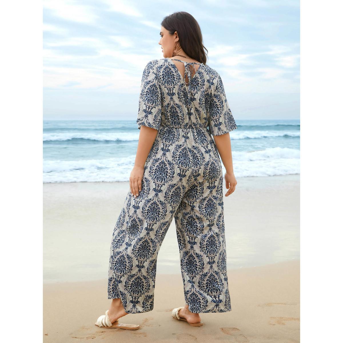 Plus Size Mediumblue Surplice Neck Ornate Print Ties Straight-Leg Jumpsuit Women Resort Half Sleeve Overlap Collar Vacation Loose Jumpsuits BloomChic 22-24/3X Product Image