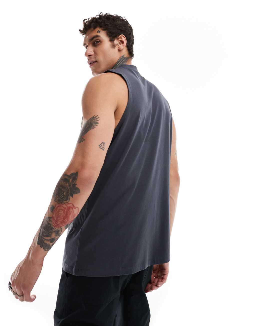 ASOS DESIGN relaxed tank top in black with grunge all over print Product Image