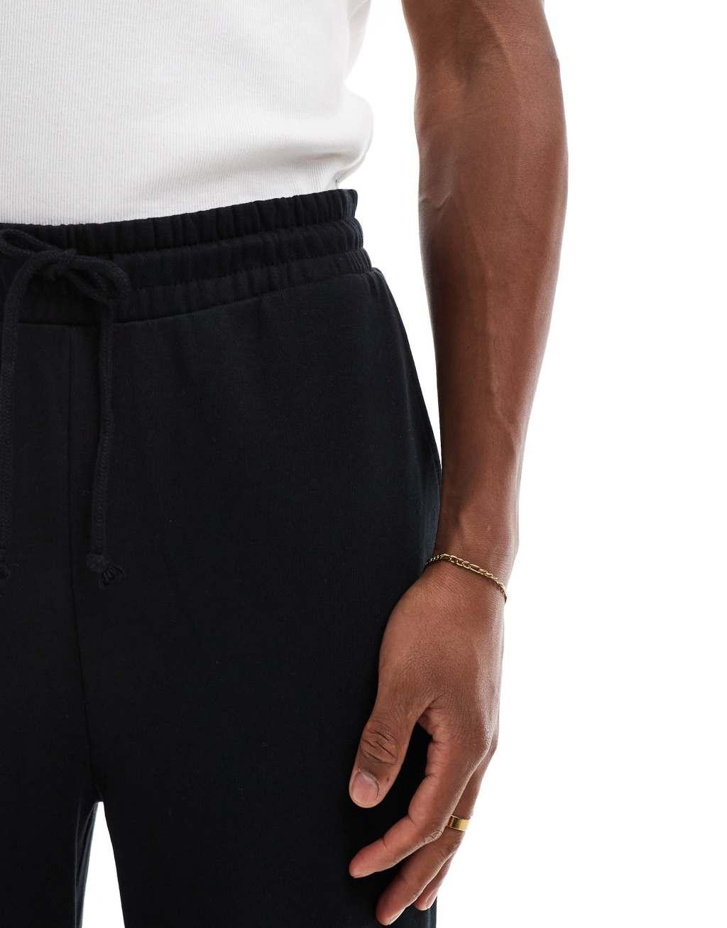 ASOS DESIGN essential wide leg sweatpants in black Product Image