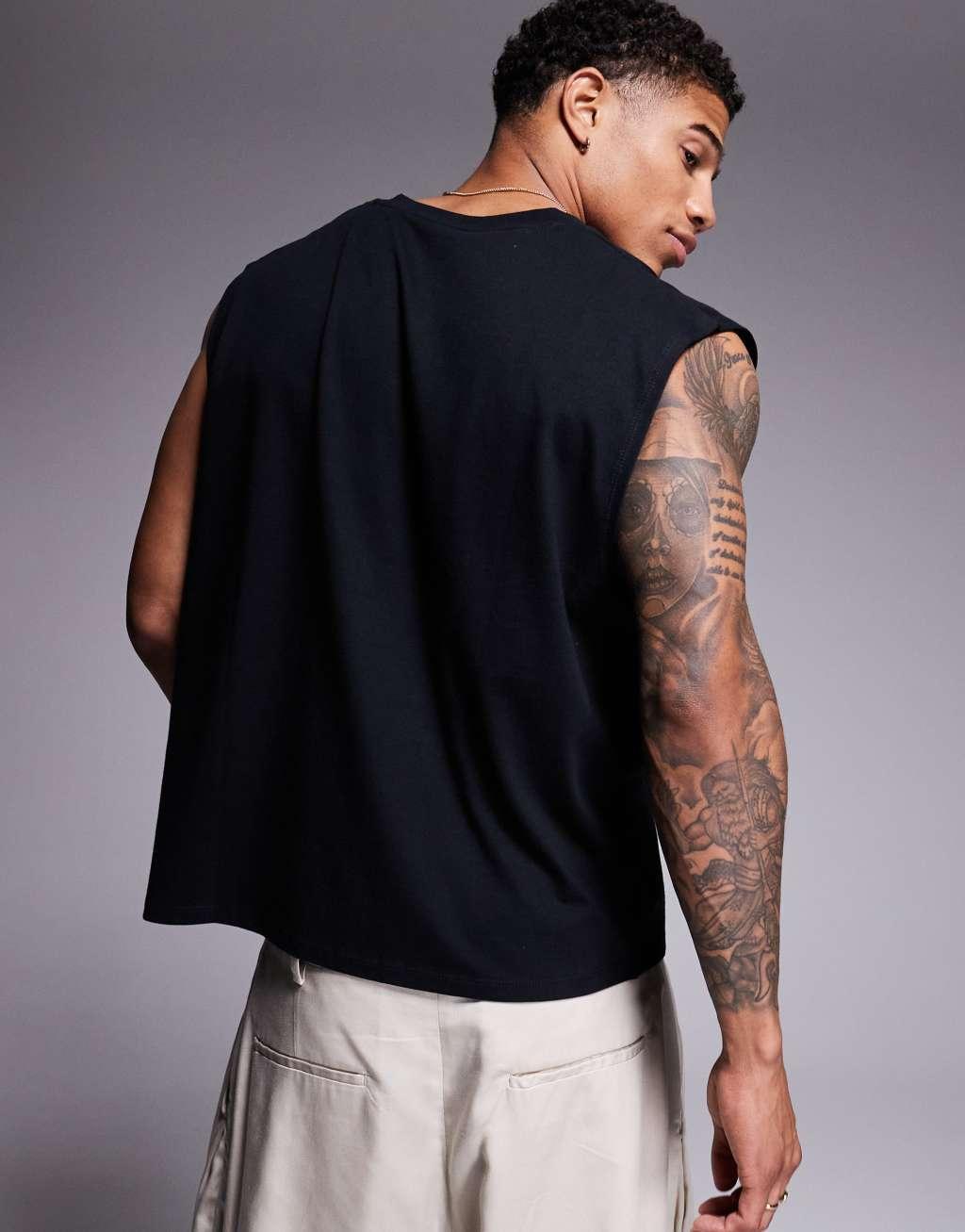 ASOS DESIGN oversized tank top with v-neck in black Product Image