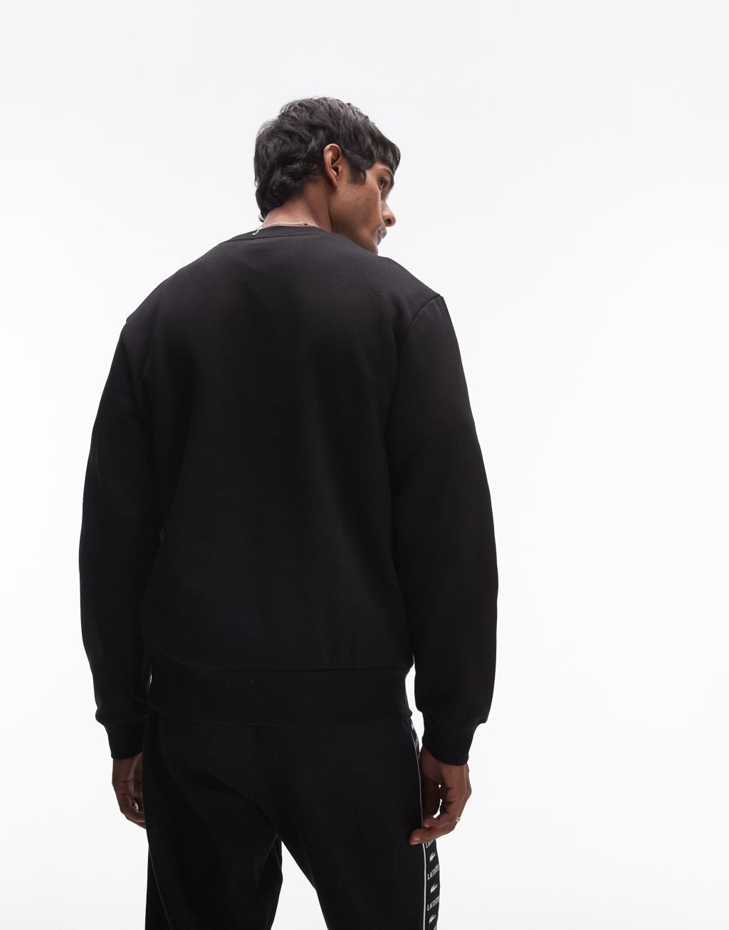 Lacoste essentials logo sweatshirt in black Product Image