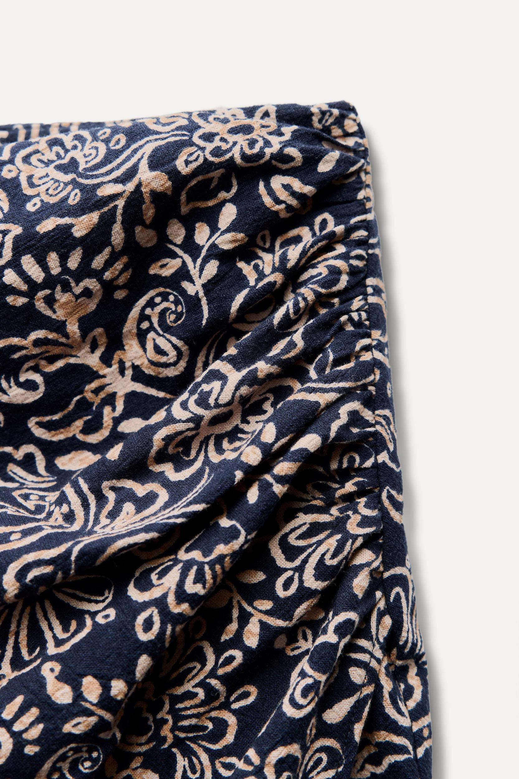 PRINTED WRAP SKIRT Product Image