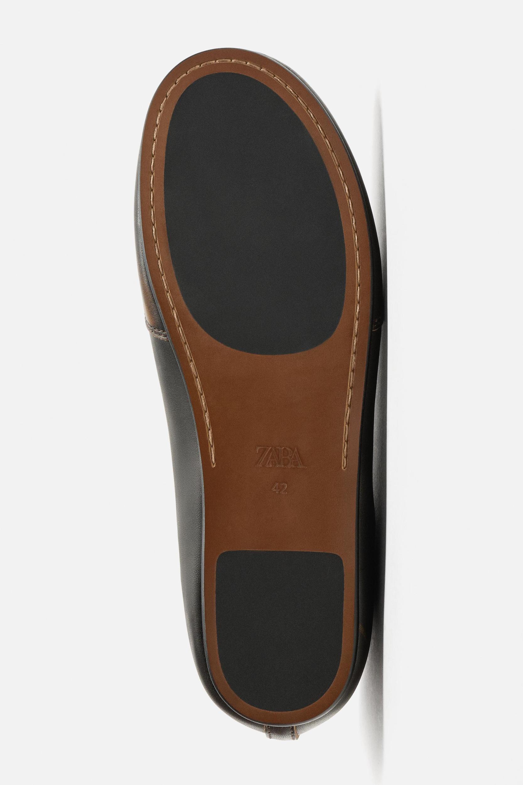 LIMITED EDITION LEATHER SNEAKERS Product Image