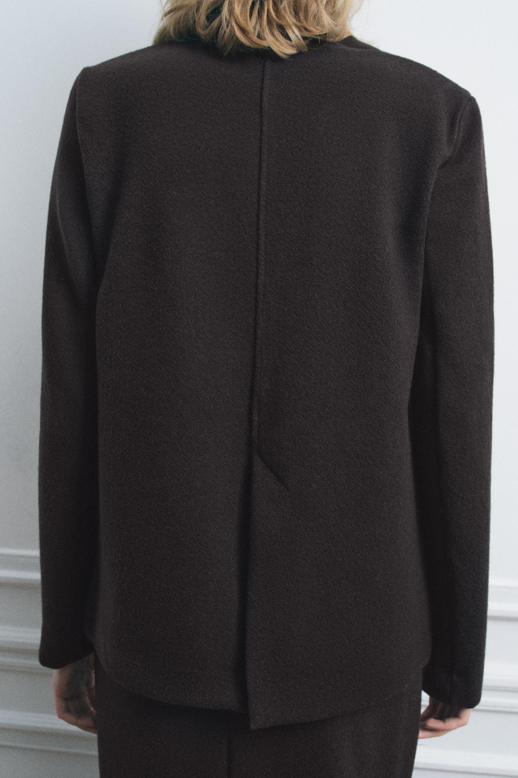 V-NECK SHOULDER PAD TOP Product Image