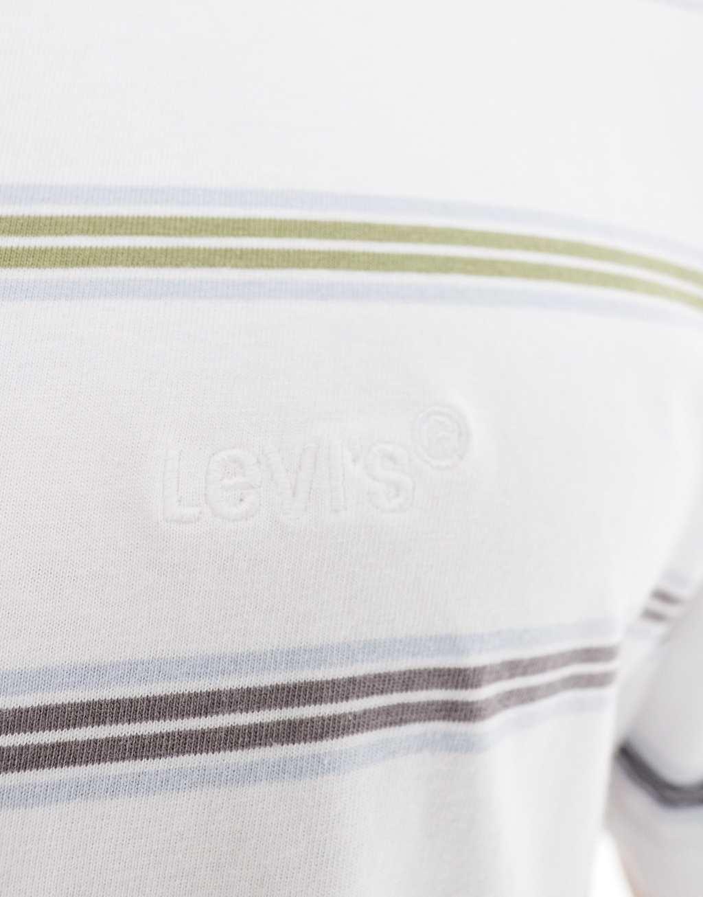 Levi's Authentic logo multi stripe jersey polo in white Product Image