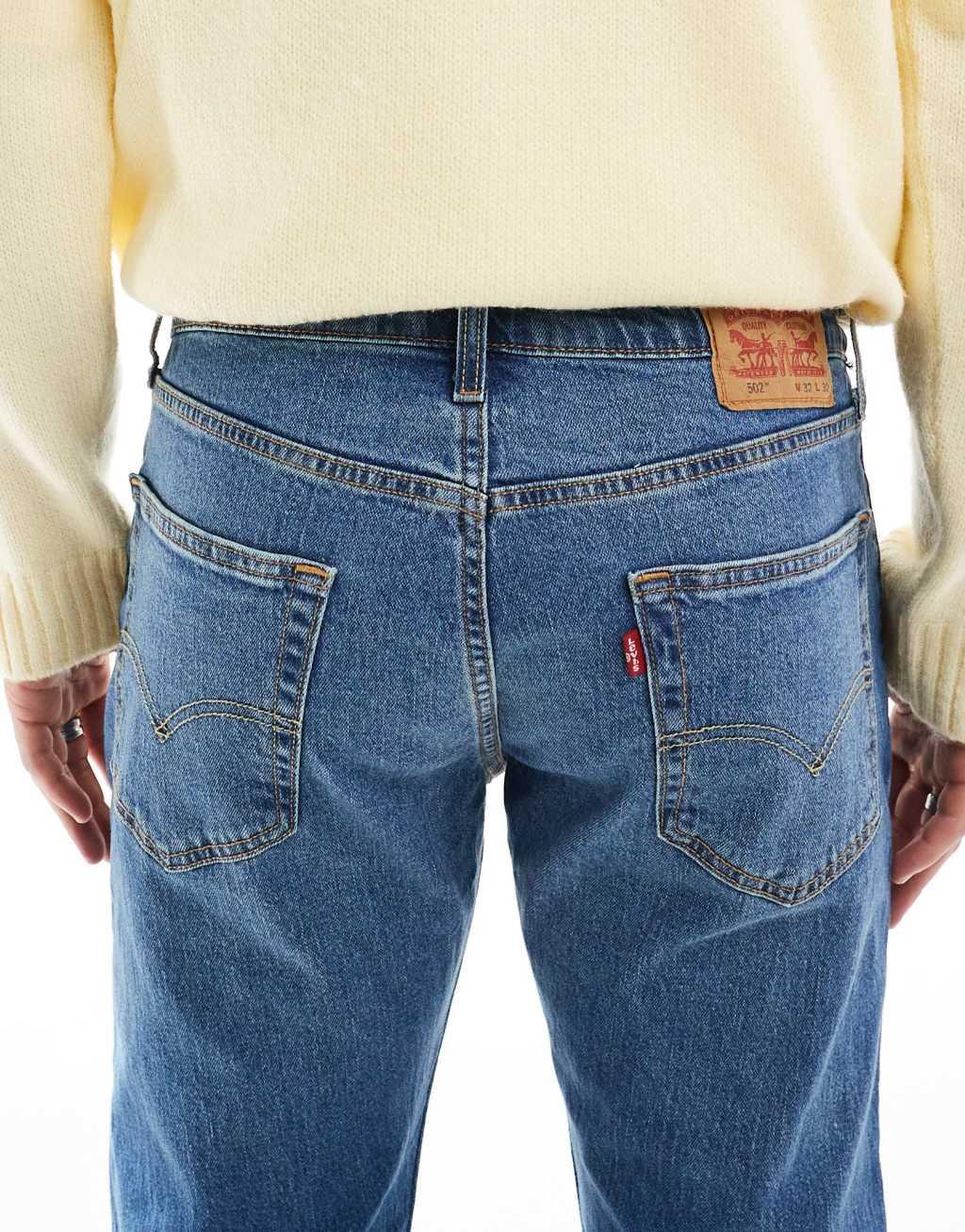Levi's 502 tapered fit jeans in mid wash Product Image