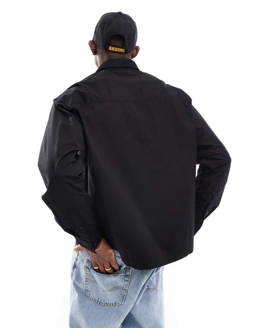 ASOS DESIGN boxy shirt with square pockets in black Product Image