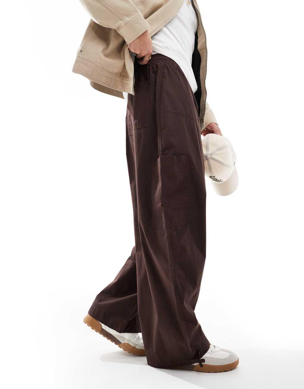 ASOS DESIGN super baggy cargo pants with panel detailing in brown Product Image