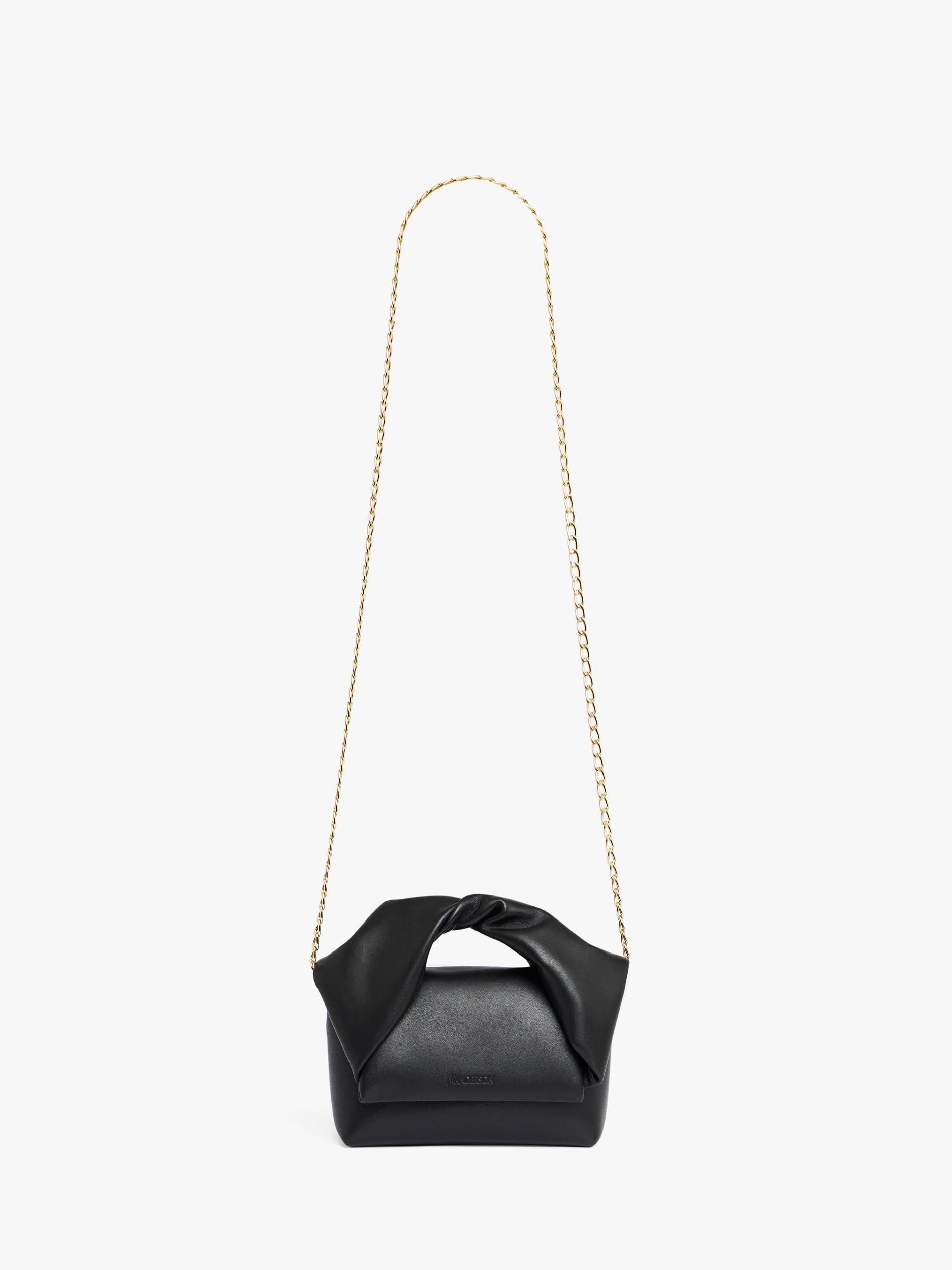 SMALL TWISTER - LEATHER TOP HANDLE BAG Product Image