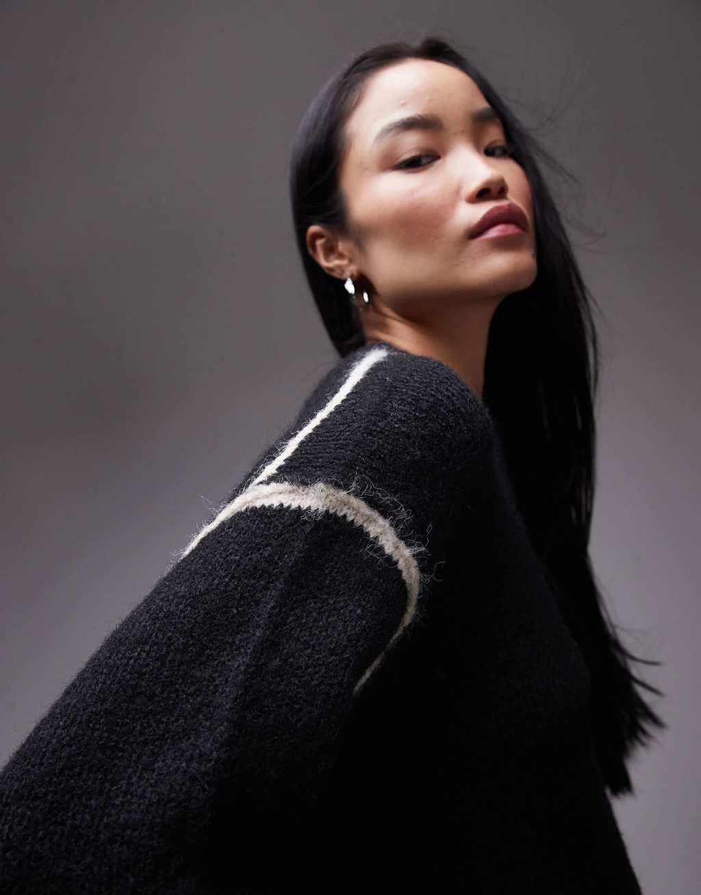 Topshop knitted exposed contrast seam oversized sweater in black Product Image