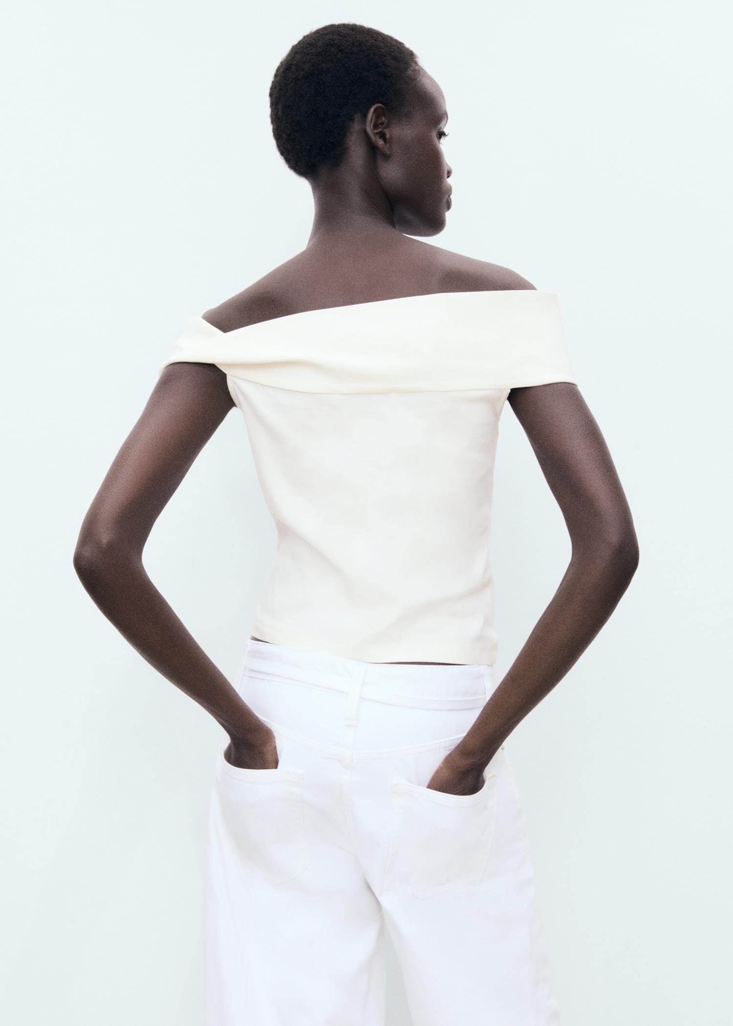 Asymmetrical strapless top - Women | MANGO USA Product Image
