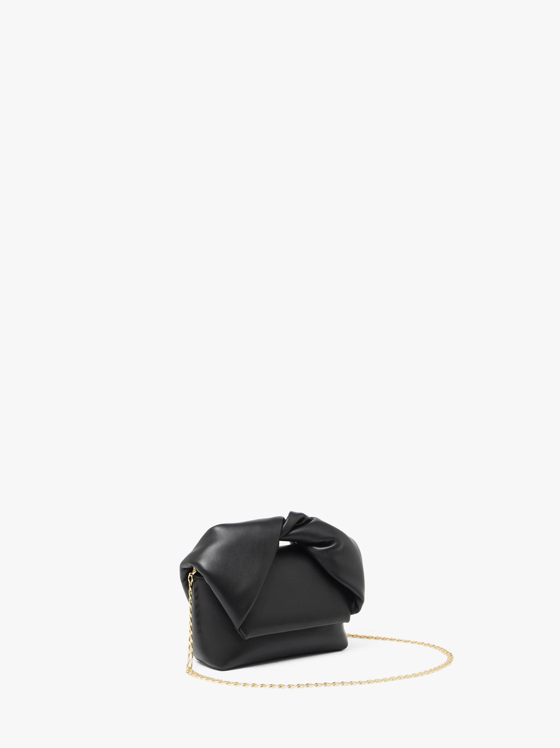 SMALL TWISTER - LEATHER TOP HANDLE BAG Product Image