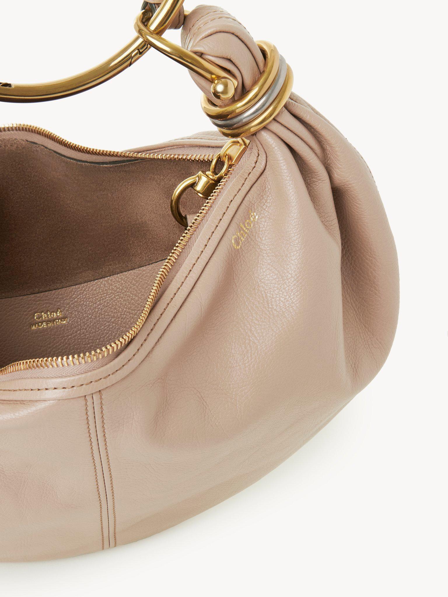 Small Bracelet hobo bag in grained leather Product Image