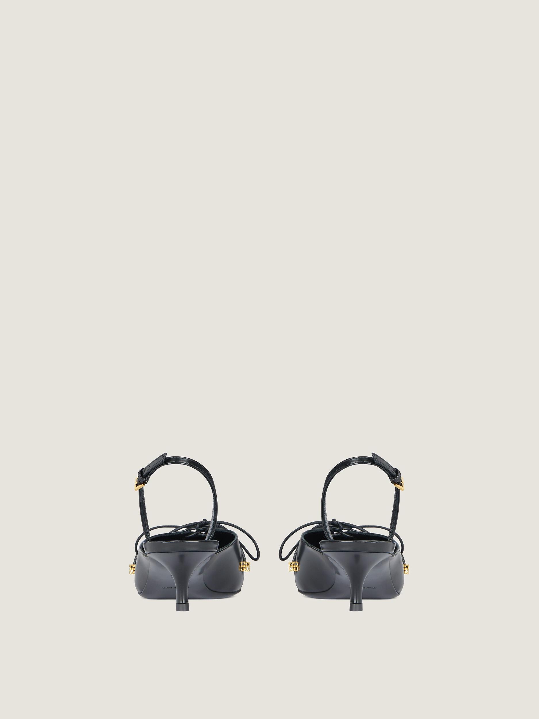 Lace-up slingbacks in leather Product Image