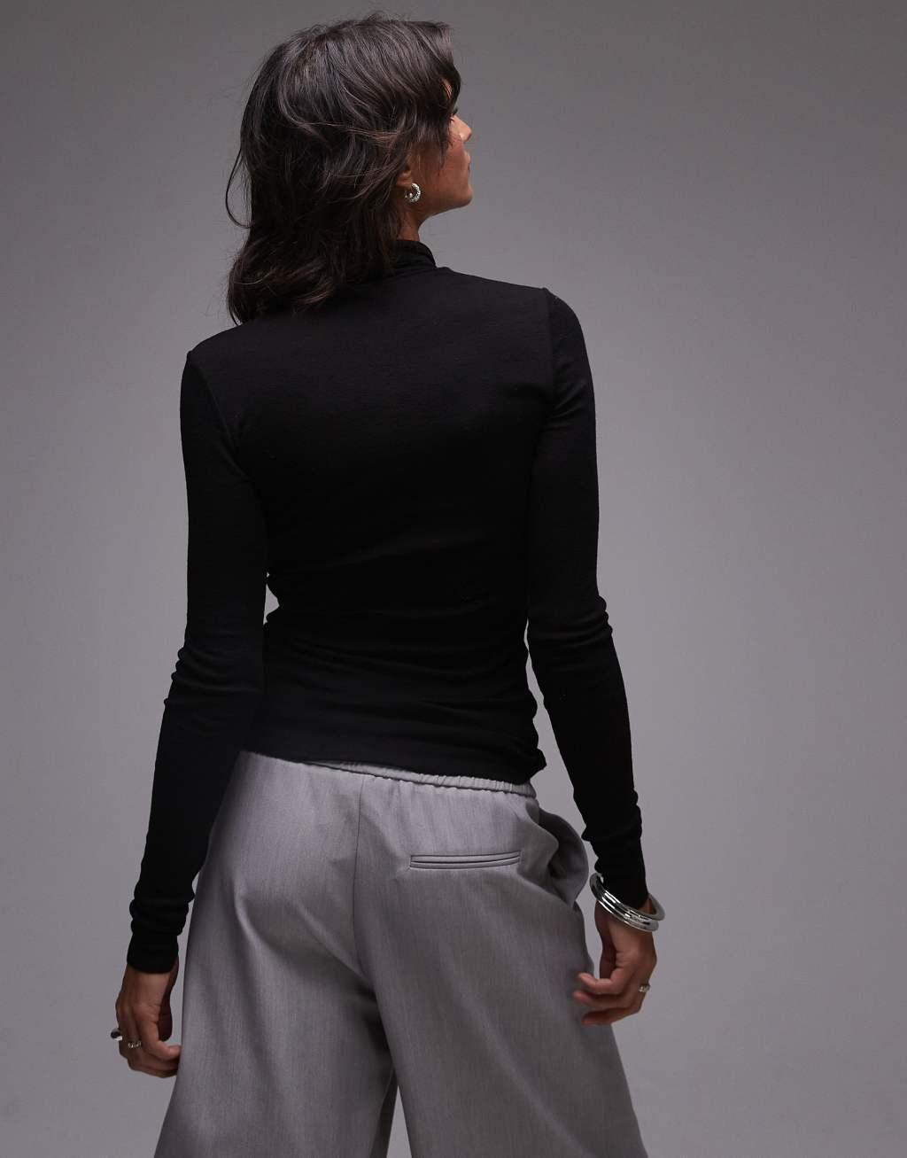 ARKET merino wool knit ribbed turtle neck top in black Product Image