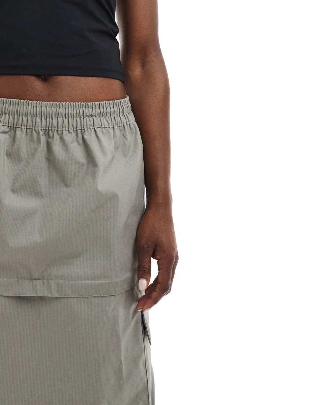 Nike essential cargo midi skirt in gray Product Image