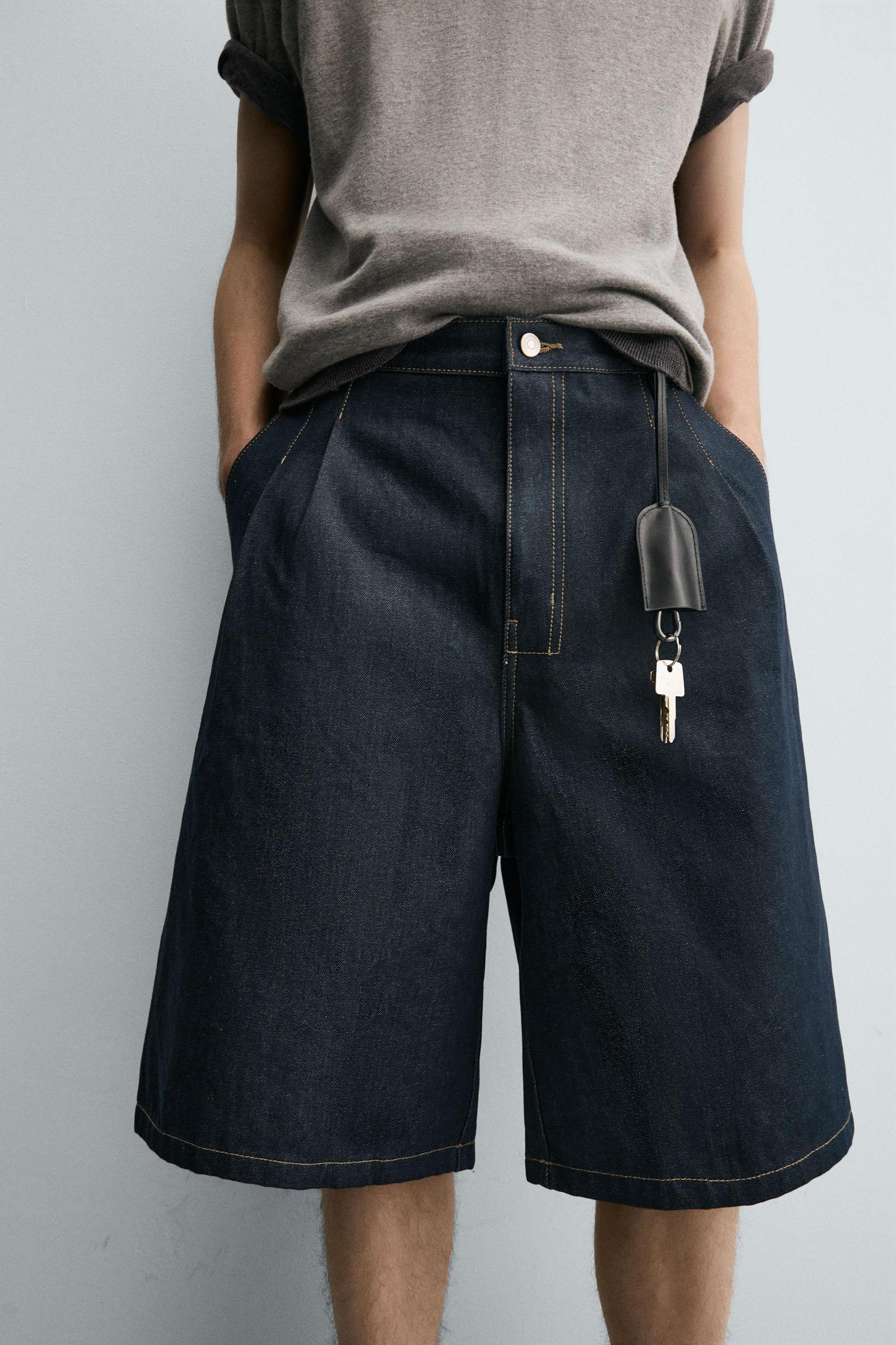 RELAXED FIT PLEATED DENIM SHORTS Product Image