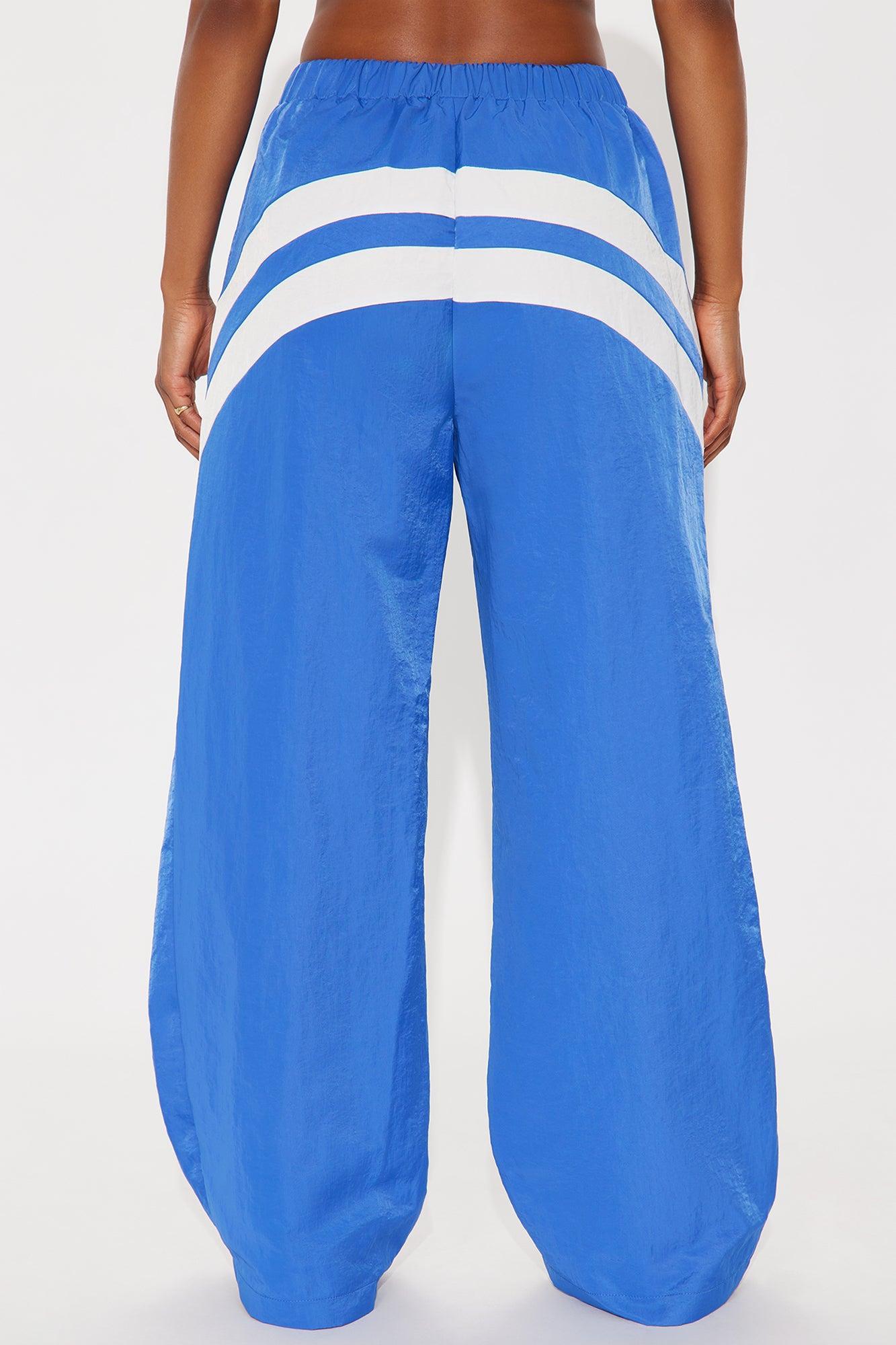 Follow The Curve Windbreaker Track Pant - Blue Product Image