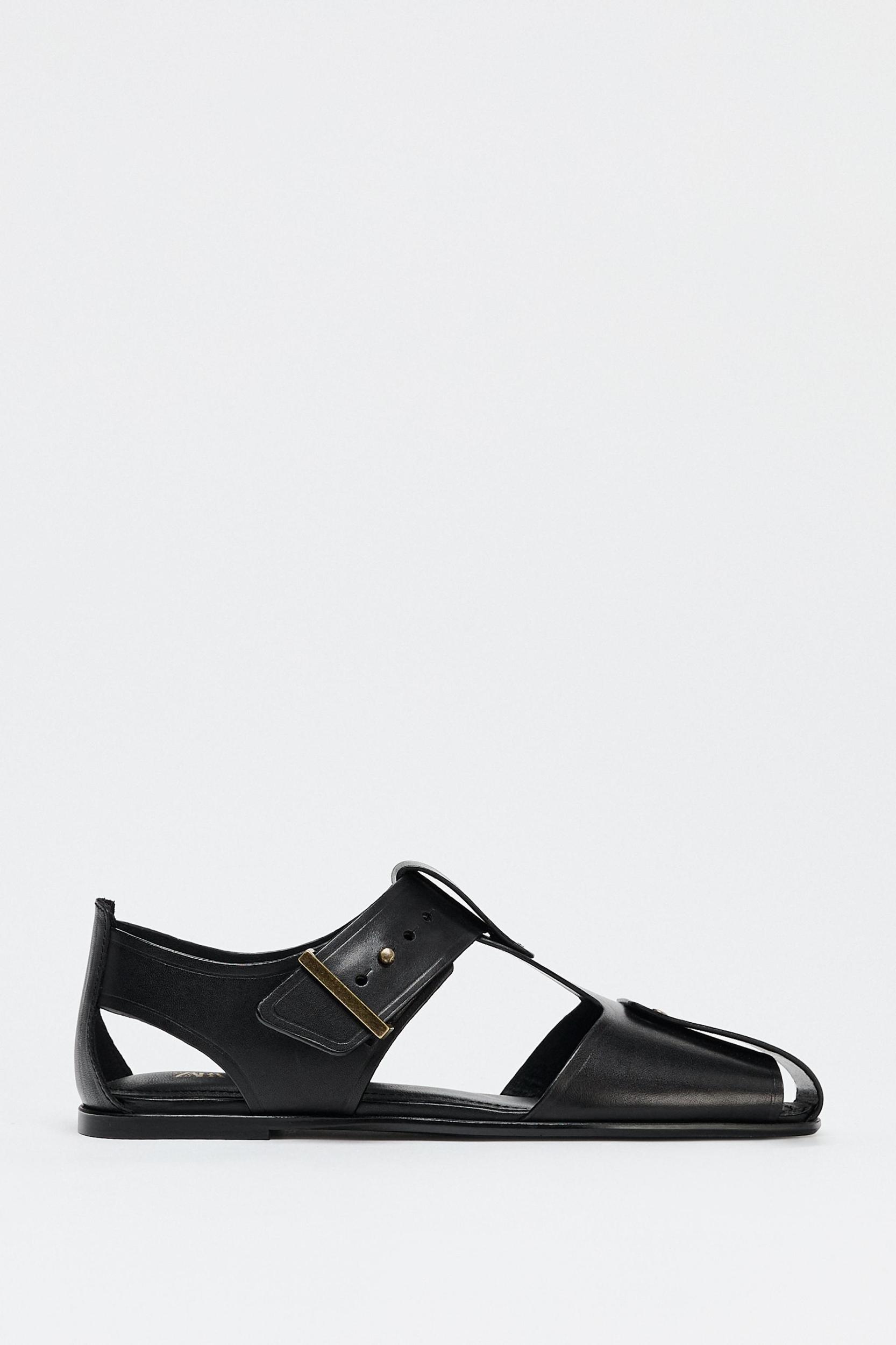 LEATHER STUDDED CAGE SANDALS Product Image