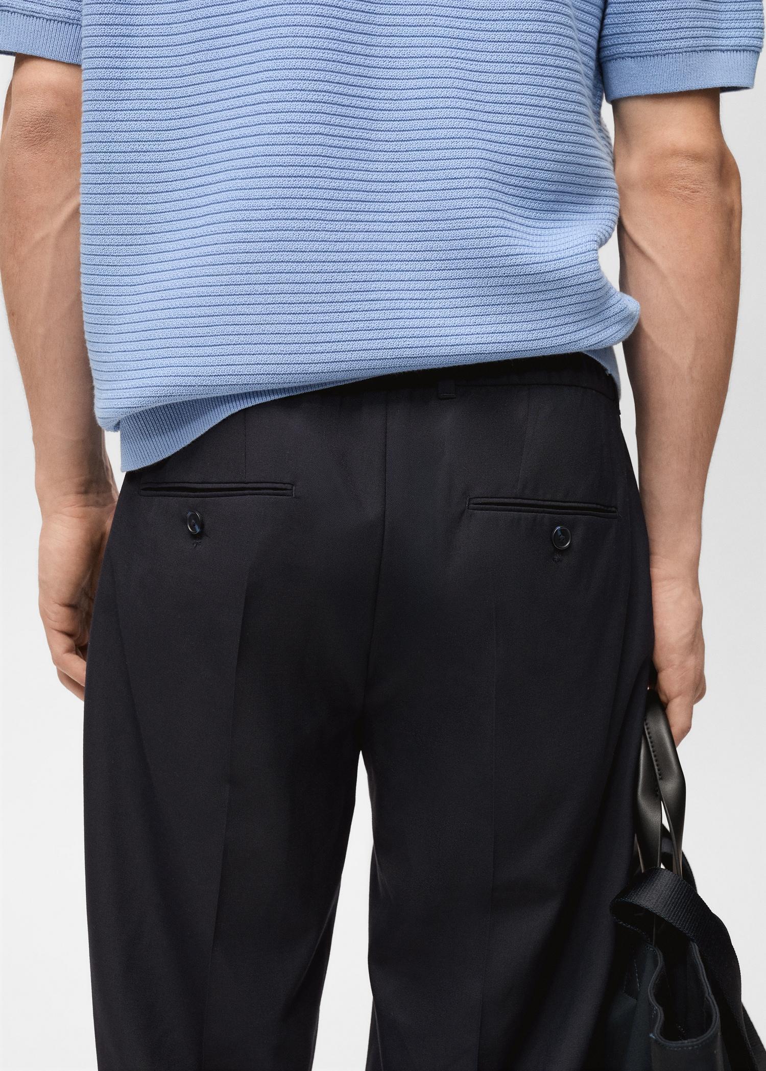 Slim-fit pleated cool wool pants - Men | MANGO USA Product Image