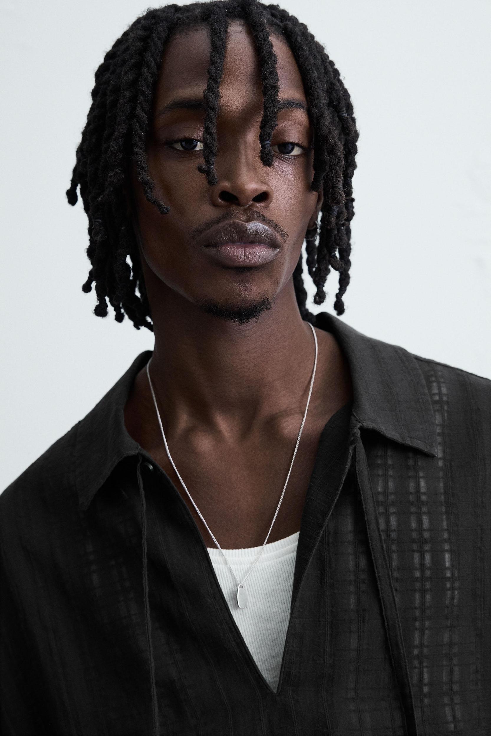 TEXTURED SEMI-SHEER POLO SHIRT Product Image