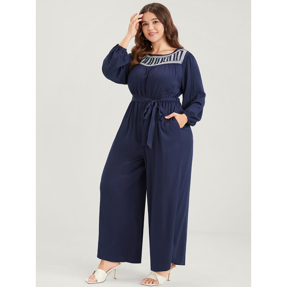 Plus Size DarkBlue Solid Pocket Lantern Sleeve Embroidered Belted Jumpsuit Women Elegant Long Sleeve Round Neck Dailywear Loose Jumpsuits BloomChic 12/L Product Image
