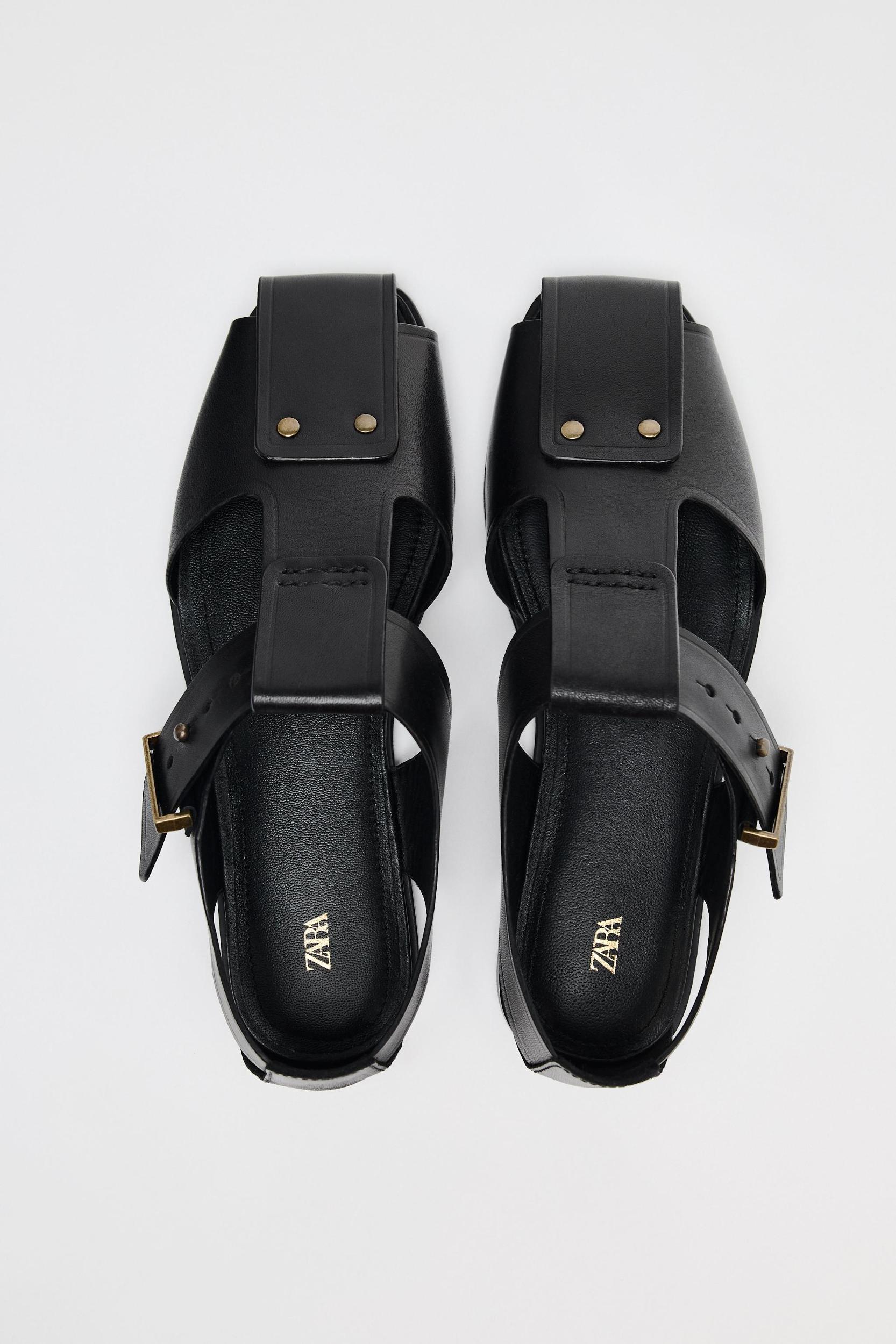 LEATHER STUDDED CAGE SANDALS Product Image