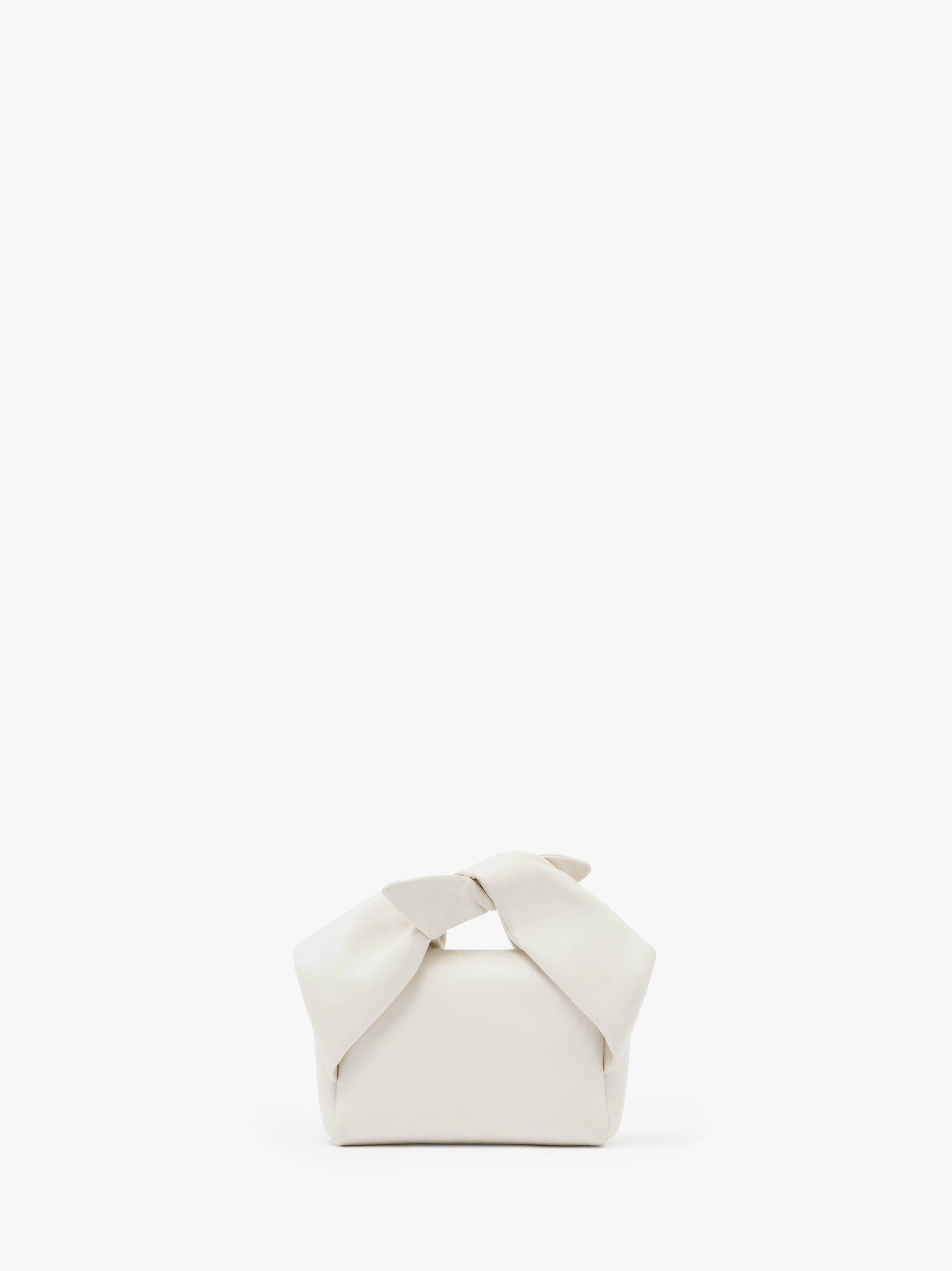 SMALL BOW TWISTER - LEATHER TOP HANDLE BAG Product Image