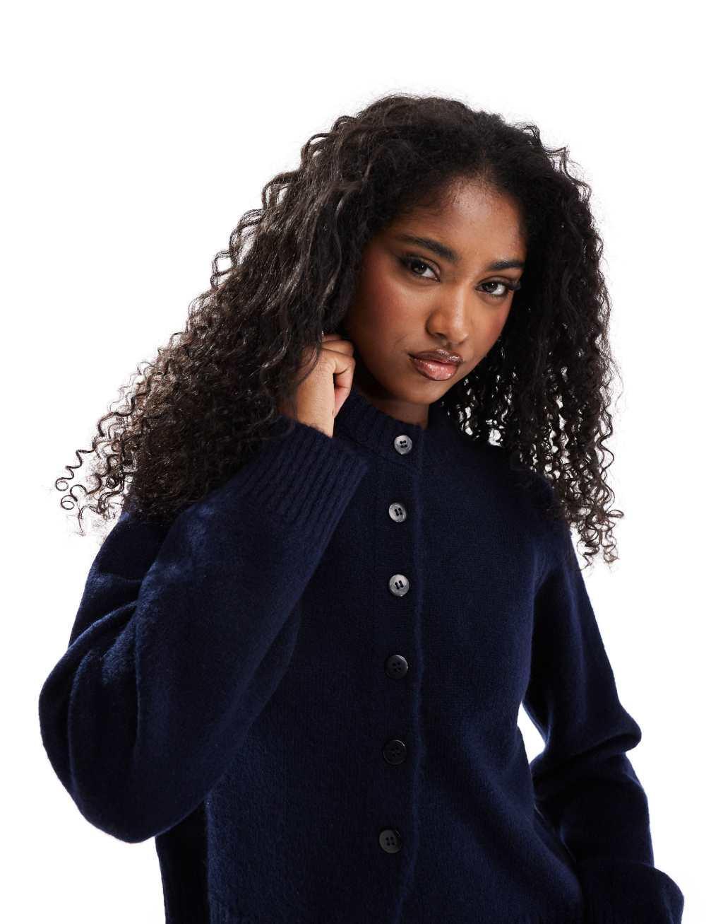 ASOS DESIGN knit crew neck cardigan with contrast buttons and split hem in navy Product Image