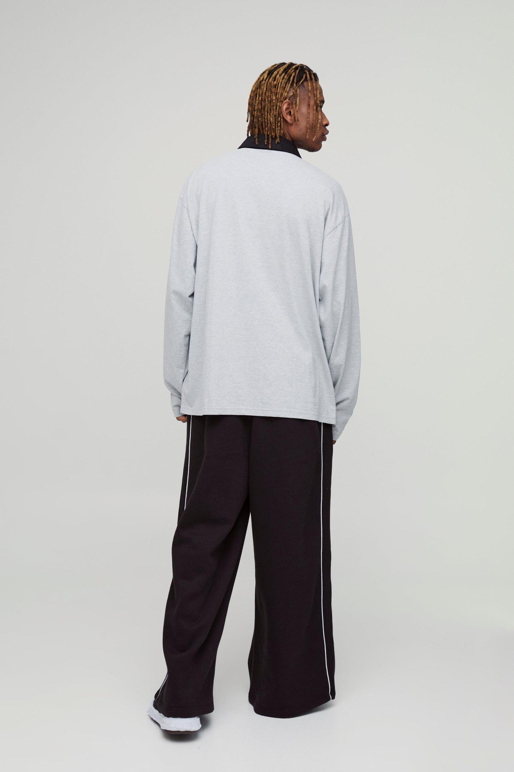 Tall Oversized Spliced Graphic Polo | boohooMAN USA Product Image