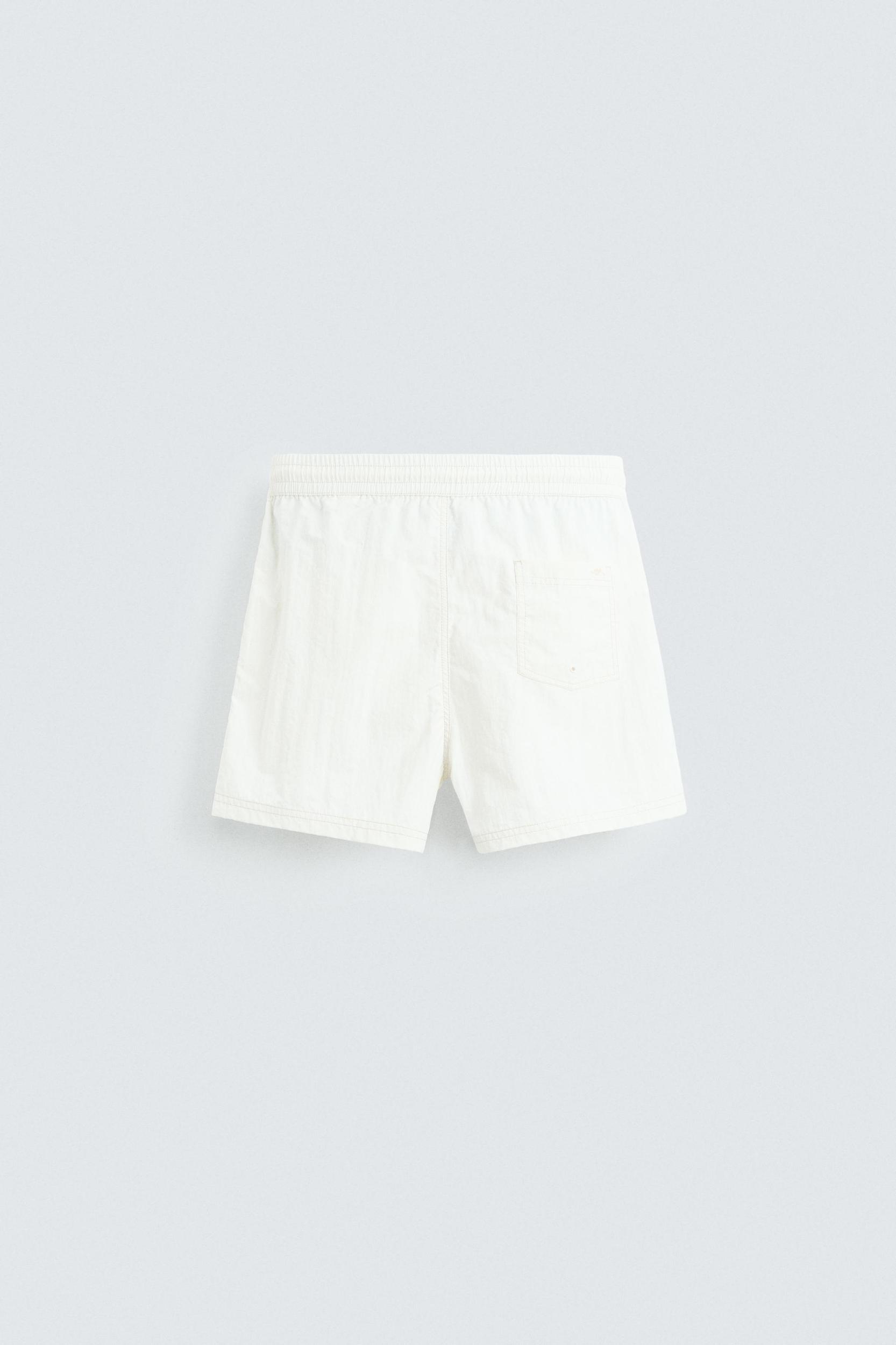 CONTRAST MID-LENGTH SWIMSUIT Product Image