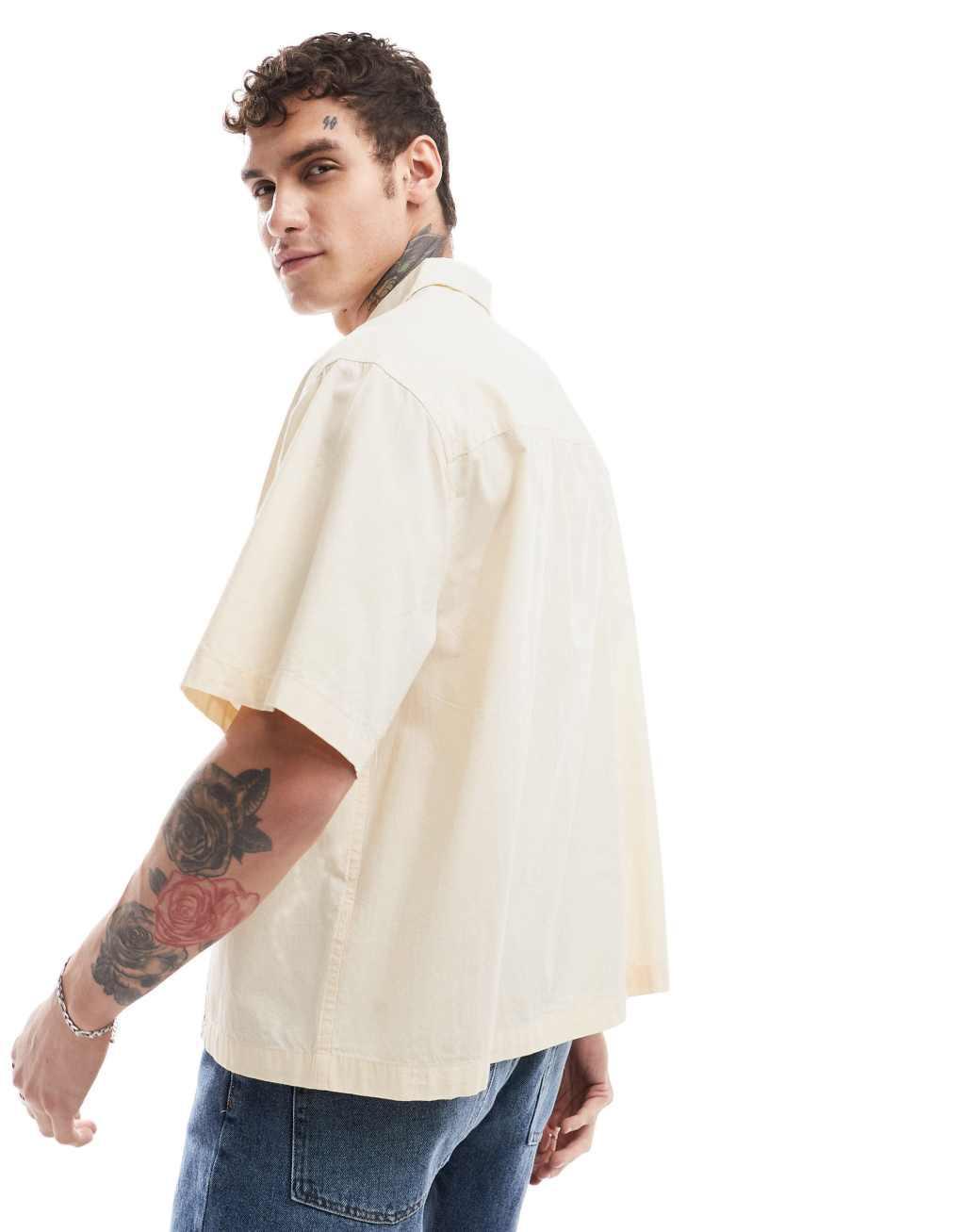 ASOS DESIGN short sleeve boxy oversized camp collar shirt with placement broderie in sand Product Image