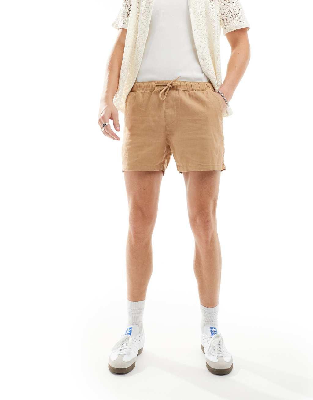 ASOS DESIGN slim linen shorts in beige Product Image