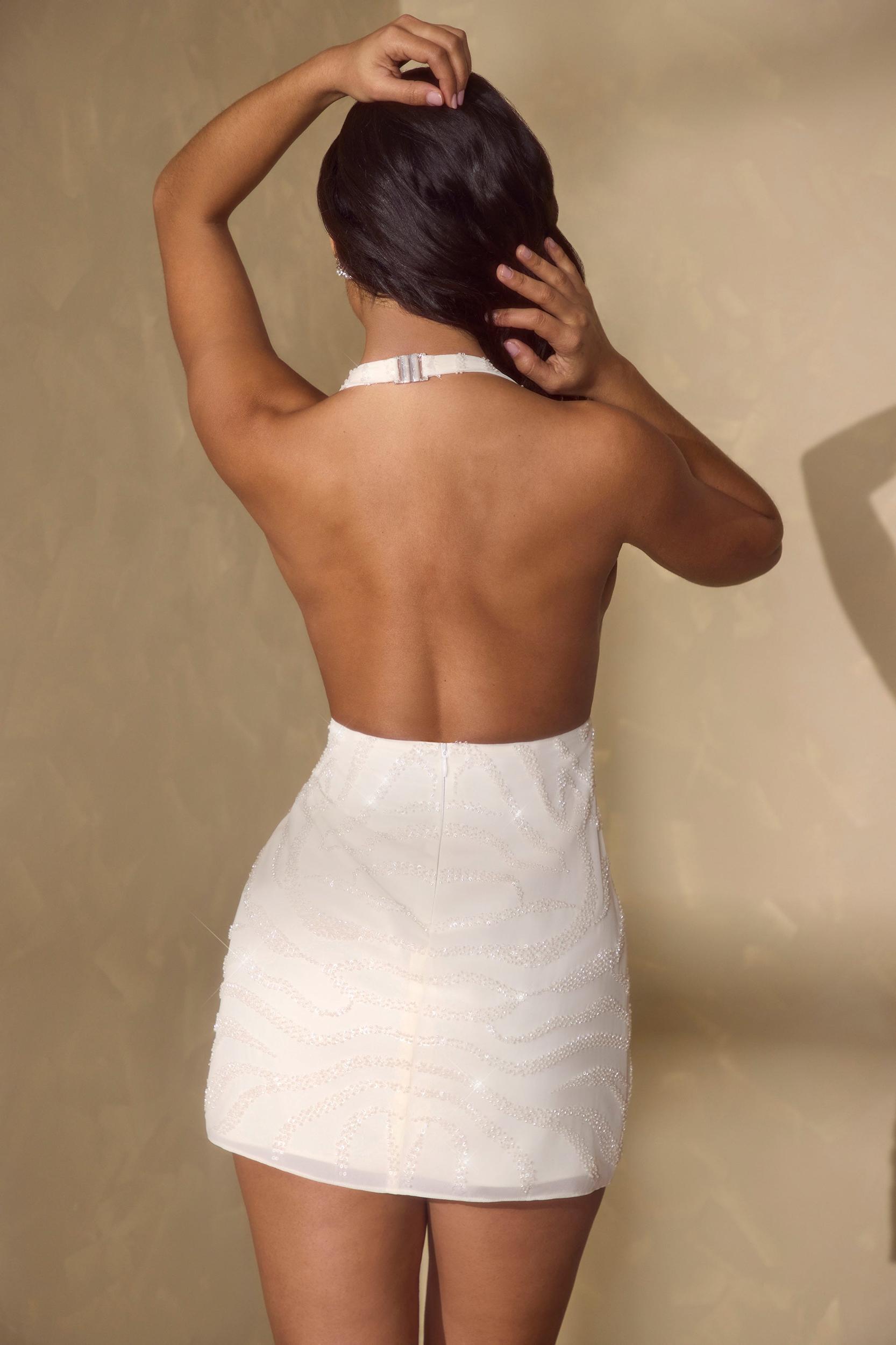Sleeveless Wrap Over Mini Dress in Off White Product Image