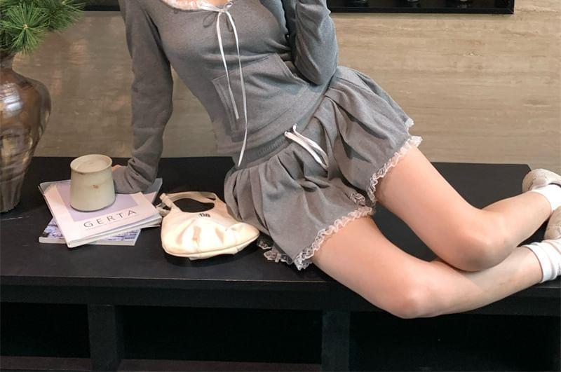 Set: Long-Sleeve Scoop Neck Plain Hooded Lace Trim Tee + Drawstring Waist Mini A-Line Skirt Product Image