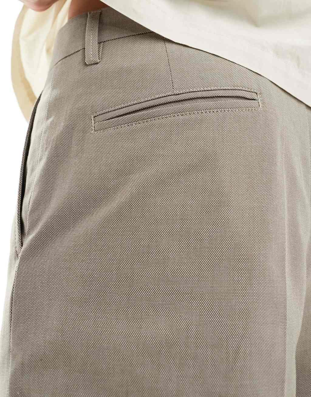 Selected Homme loose fit cropped pleat pants in beige Product Image