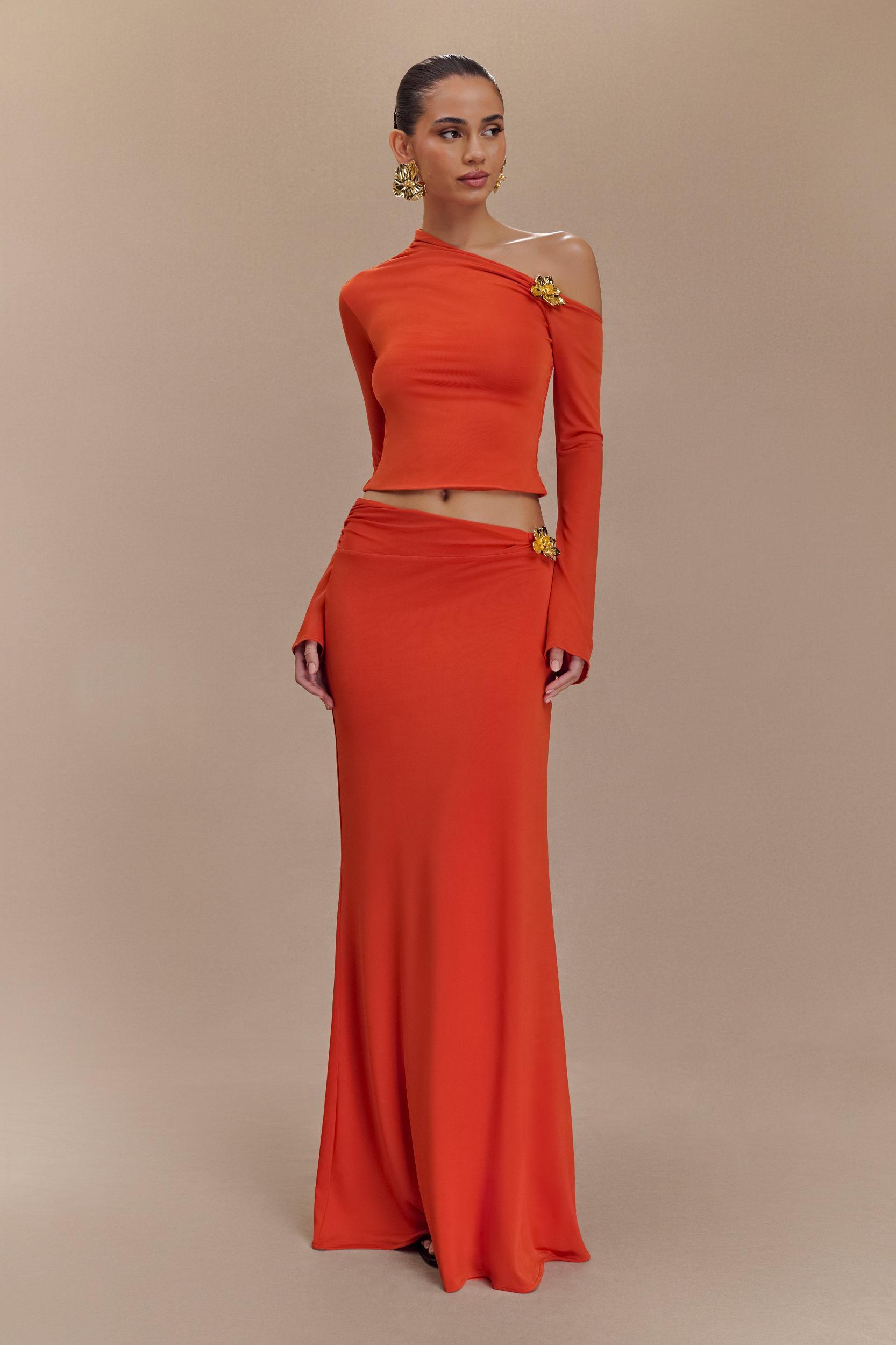 Ainsley Asymmetrical Long Sleeve Top With Floral Hardware - Burnt Orange Product Image