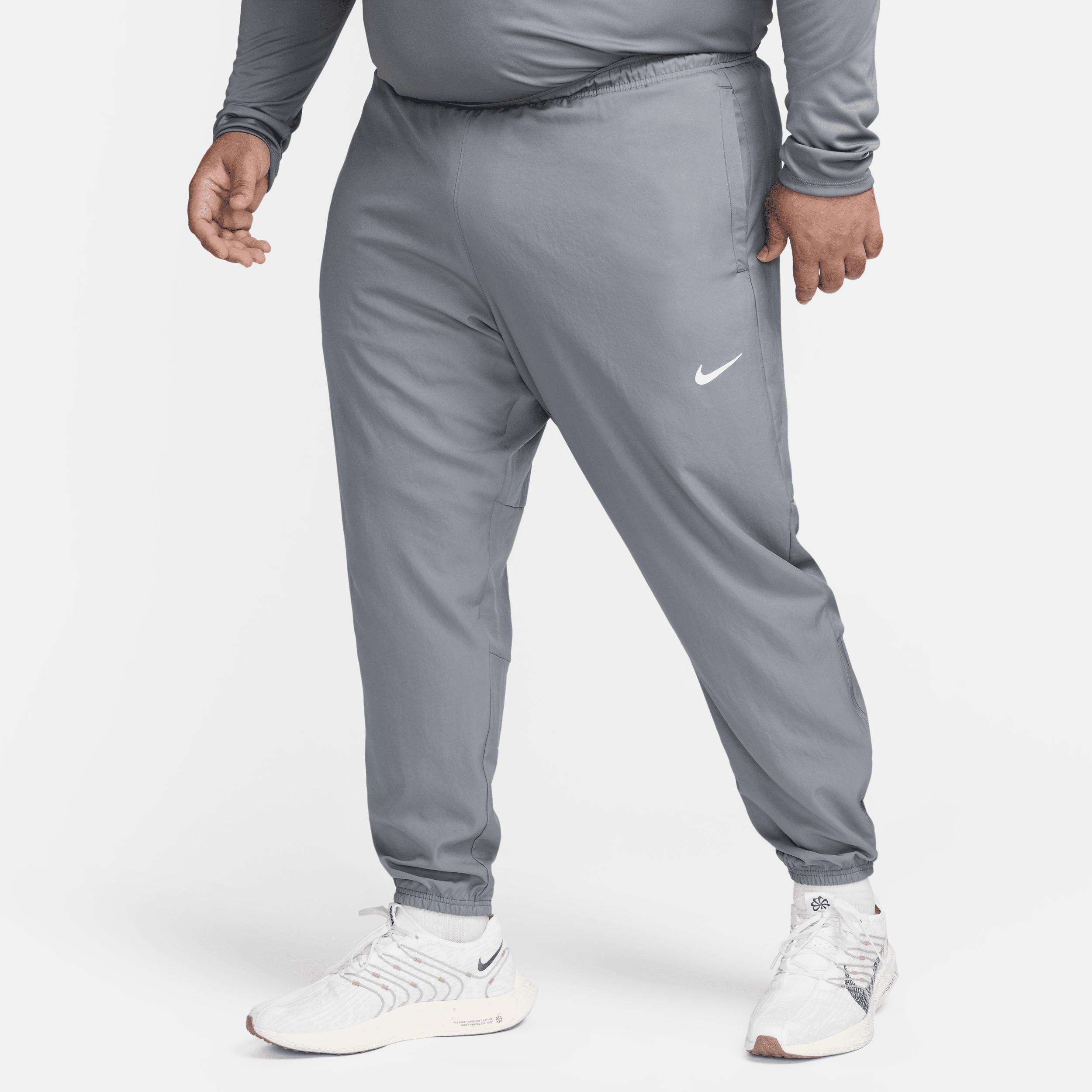 Nike Men's Challenger Dri-FIT Woven Running Pants in Grey/Smoke Grey Size Medium Polyester Product Image