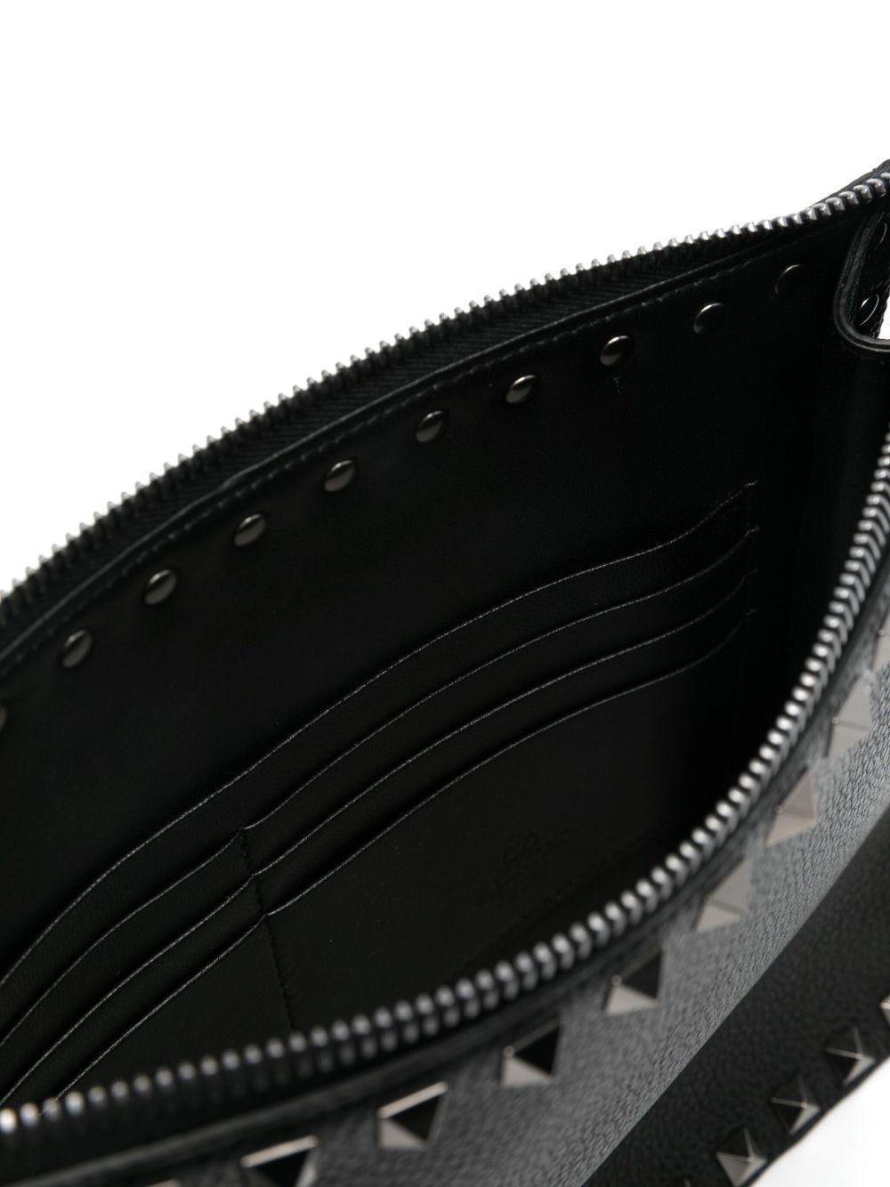 Rockstud leather clutch bag Product Image