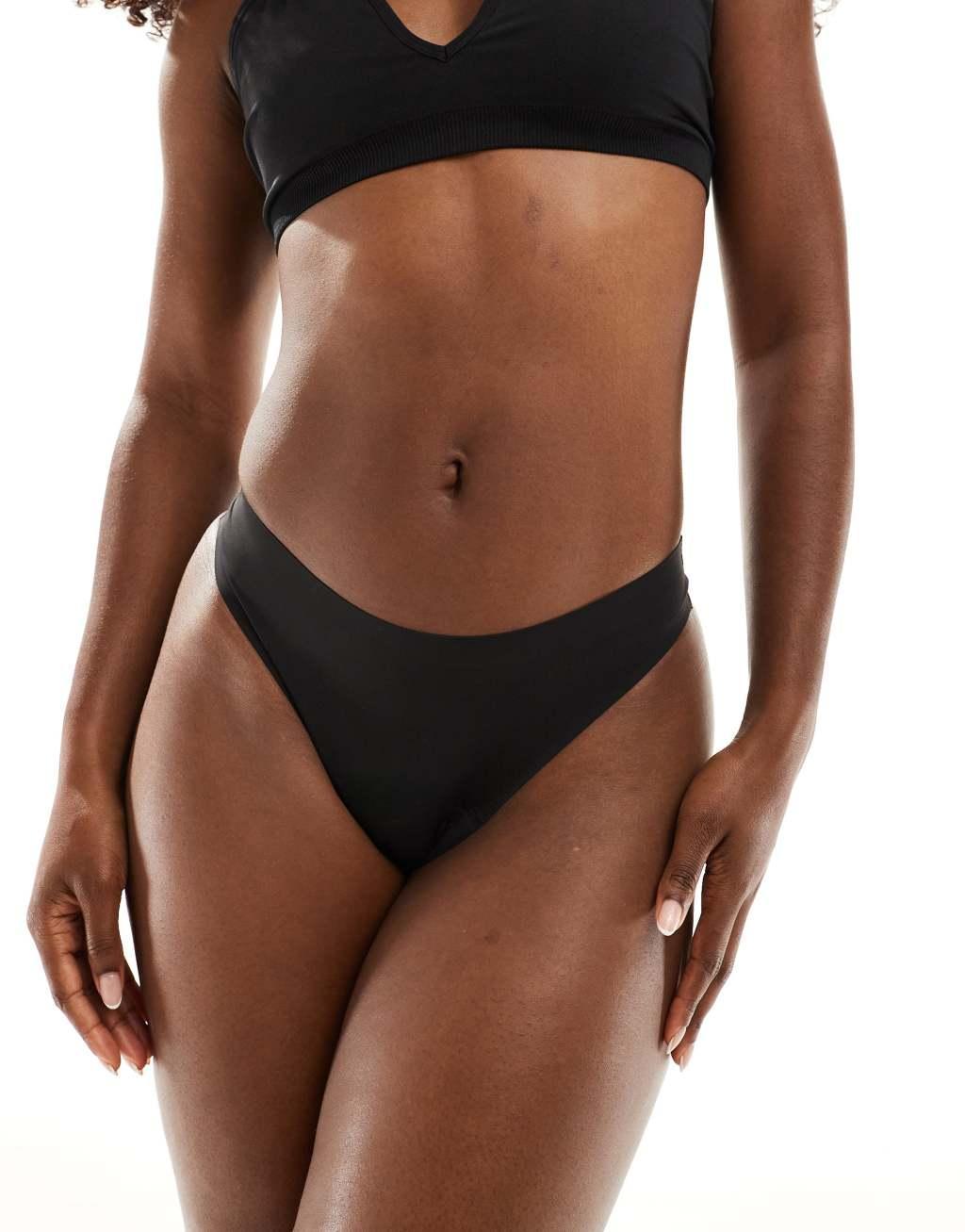 Modibodi Seamfree light absorbency period thong in black   Product Image