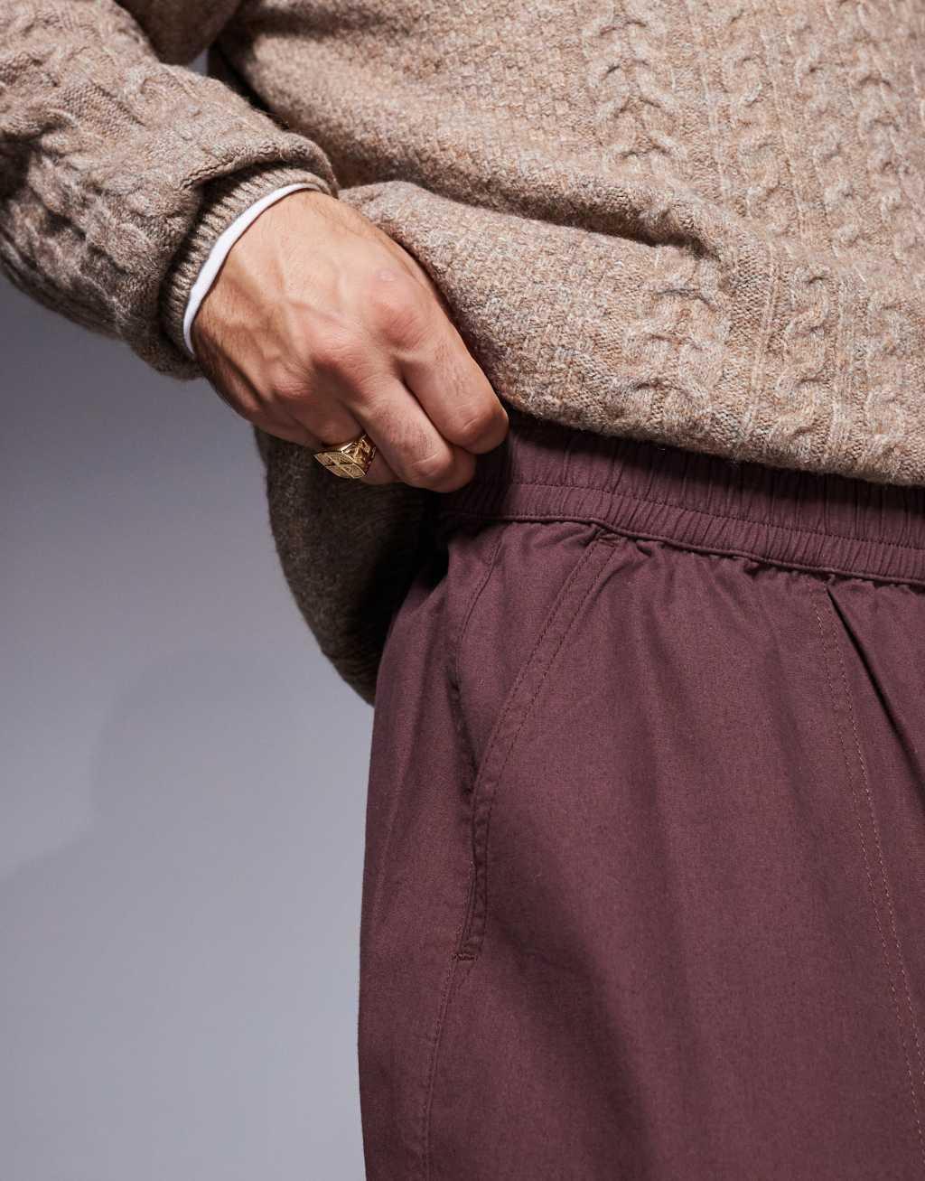 ASOS DESIGN oversized balloon cargo pants with elasticized waist in brown  Product Image