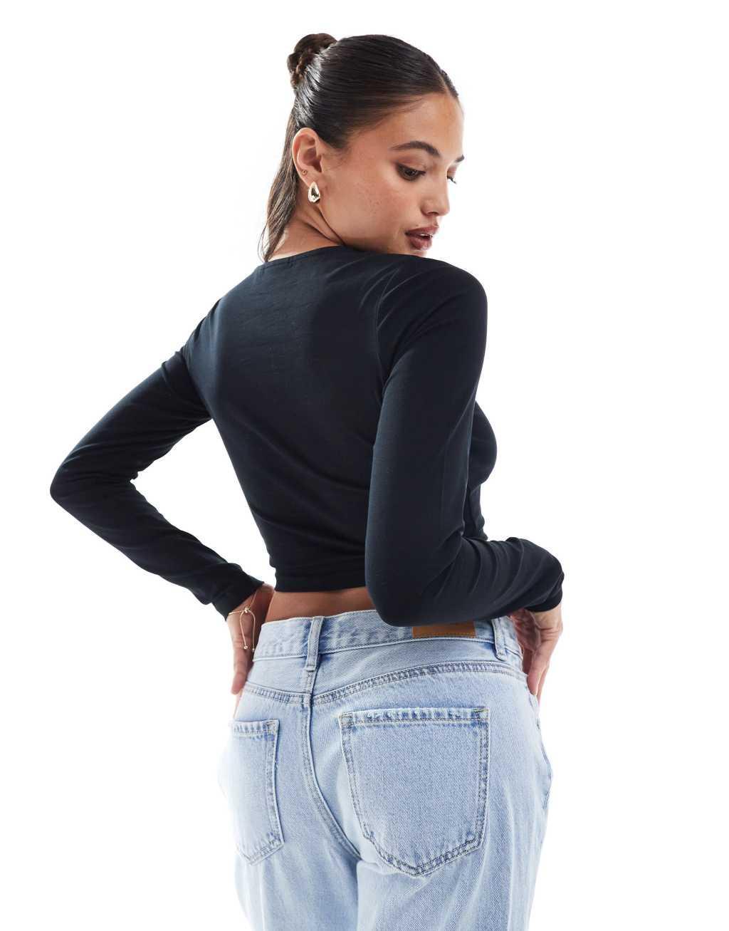 ASOS DESIGN fitted crop t-shirt with long sleeve in black Product Image