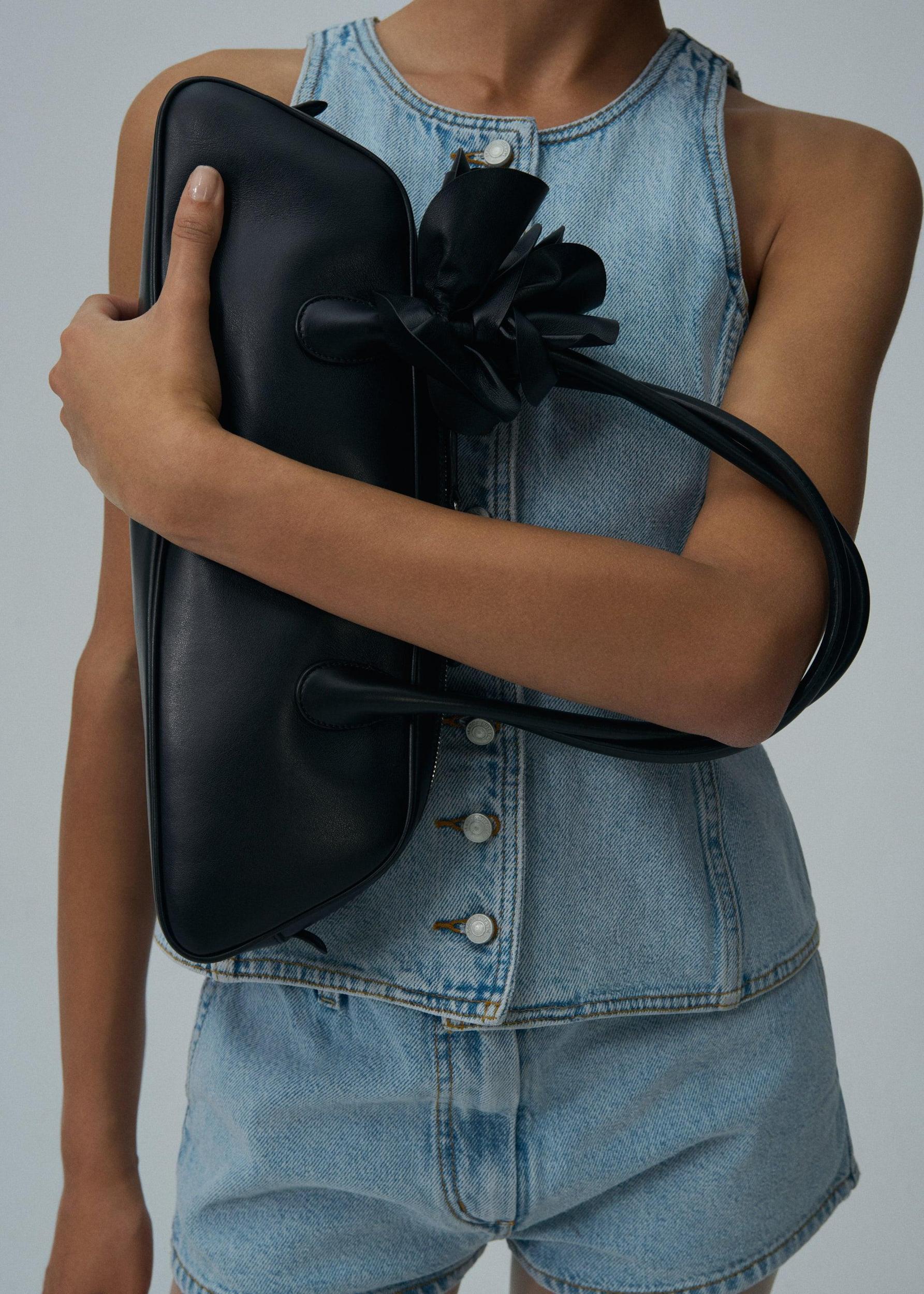 Brigitte trapeze bag in black leather and silver Product Image