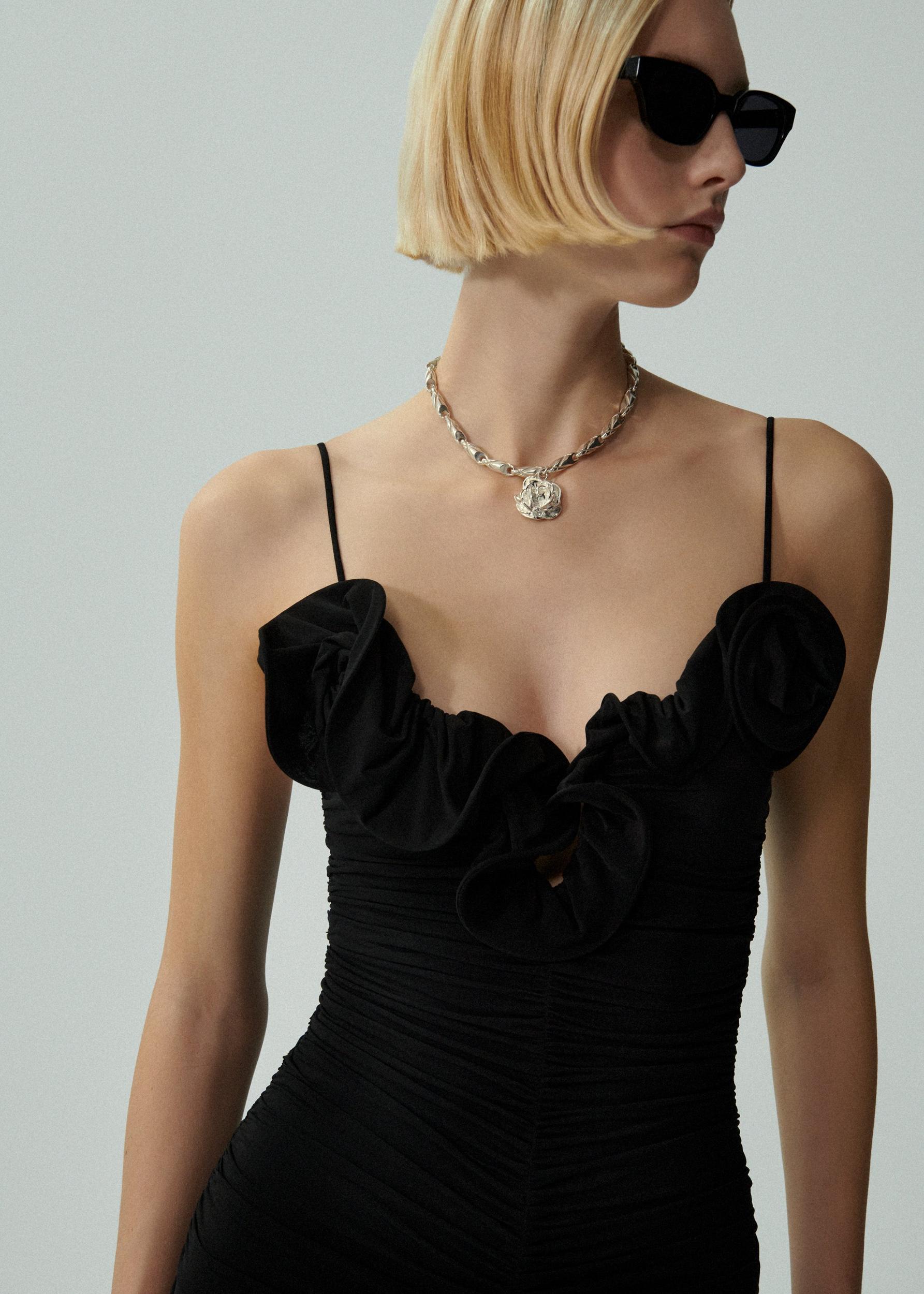 Ruched ruffle midi dress in black Product Image