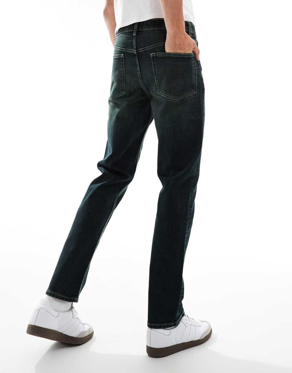 ASOS DESIGN slim jeans in washed black with green tint Product Image