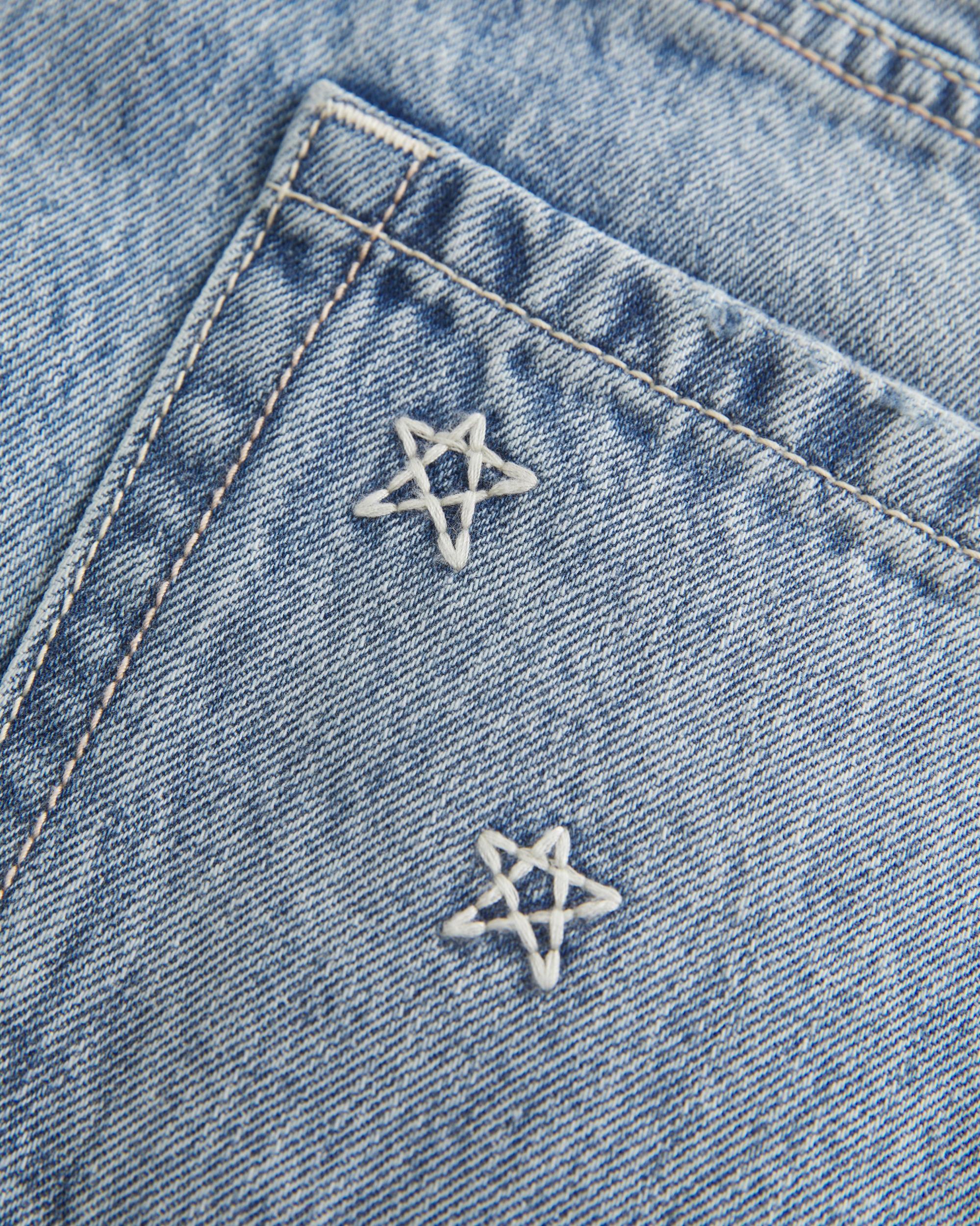 Low-Rise Light Wash Denim Mini Skort Product Image